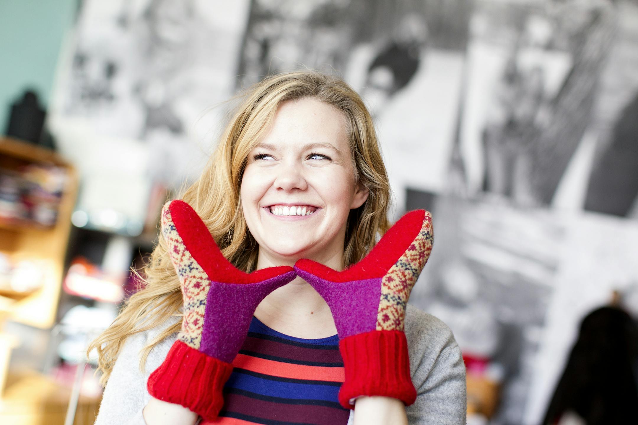 Sarah Vandelist sews mittens in her St. Paul studio December 23, 2013. (Courtney Perry/Special to the Star Tribune) ] A Macalester student and Lakeville North graduate, Vandelist started a business while in high school creating mittens from old sweaters. Years later, she has her own studio and a thriving business called Swag Mittens.