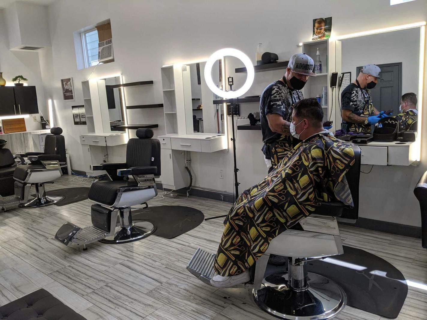 VIP Cutz in St. Paul reopened Monday despite fears because of the unrest in the Twin Cities and COVID-19 restrictions. (NICOLE NORFLEET/Star Tribune)