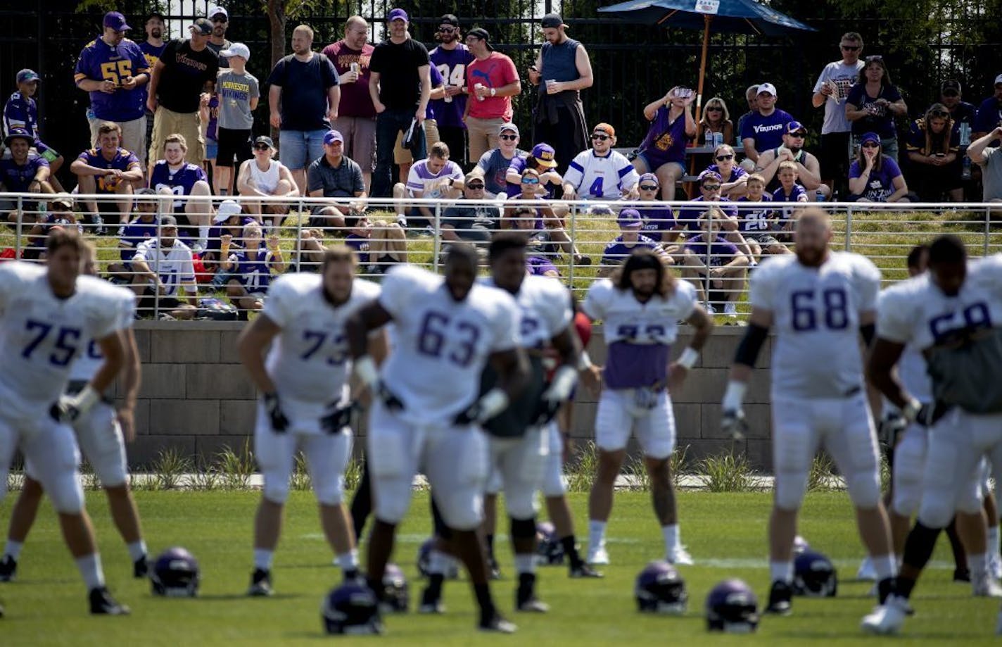 Fans watched the Vikings stretch before a training camp practice last season.