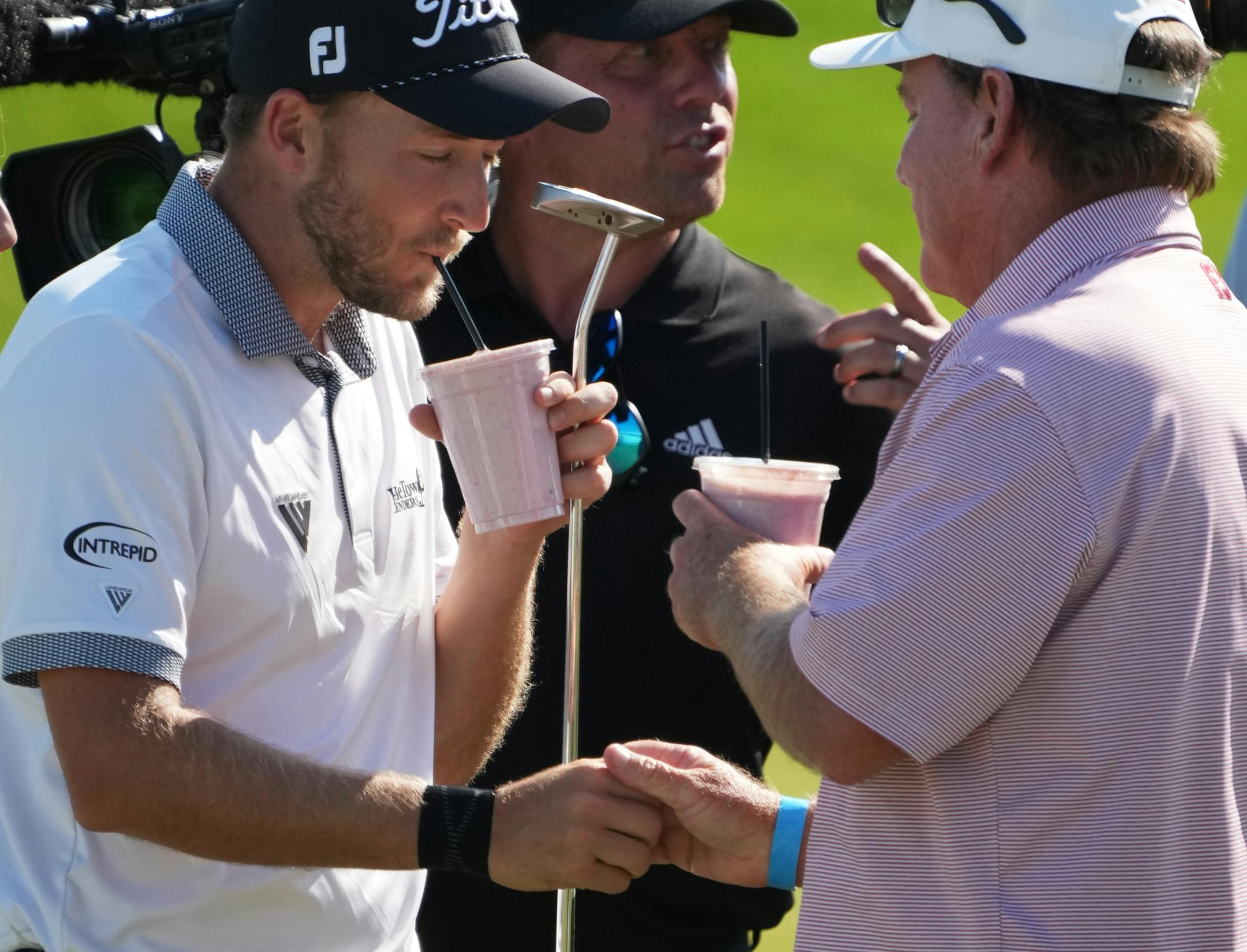 Lee Hodges drank a celebratory milk shake with his Alabama golf coach Jay Seawell after his 3M Open win.
