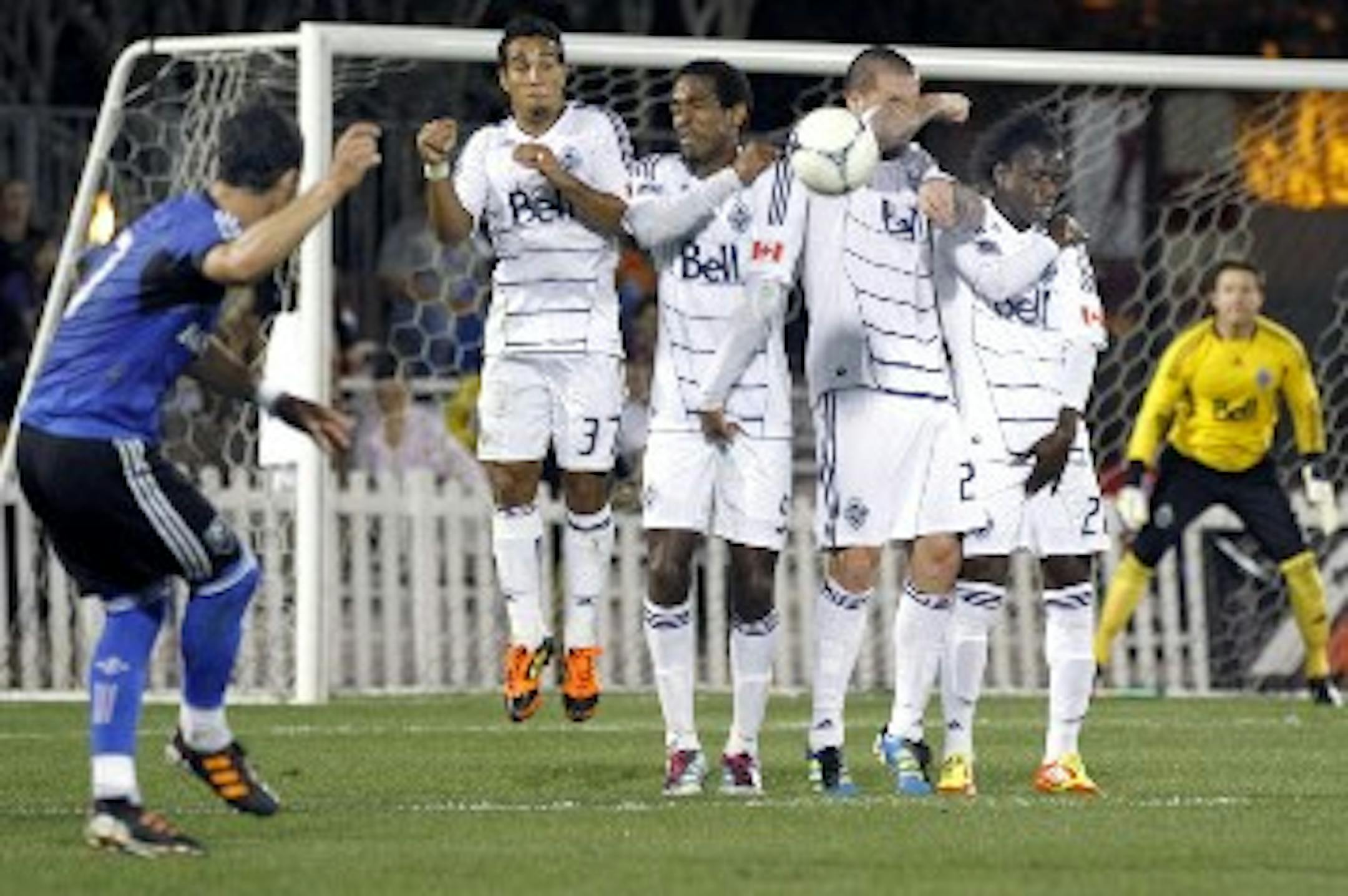 Darren Mattocks, far right on the wall, trying to prevent an injury in this case