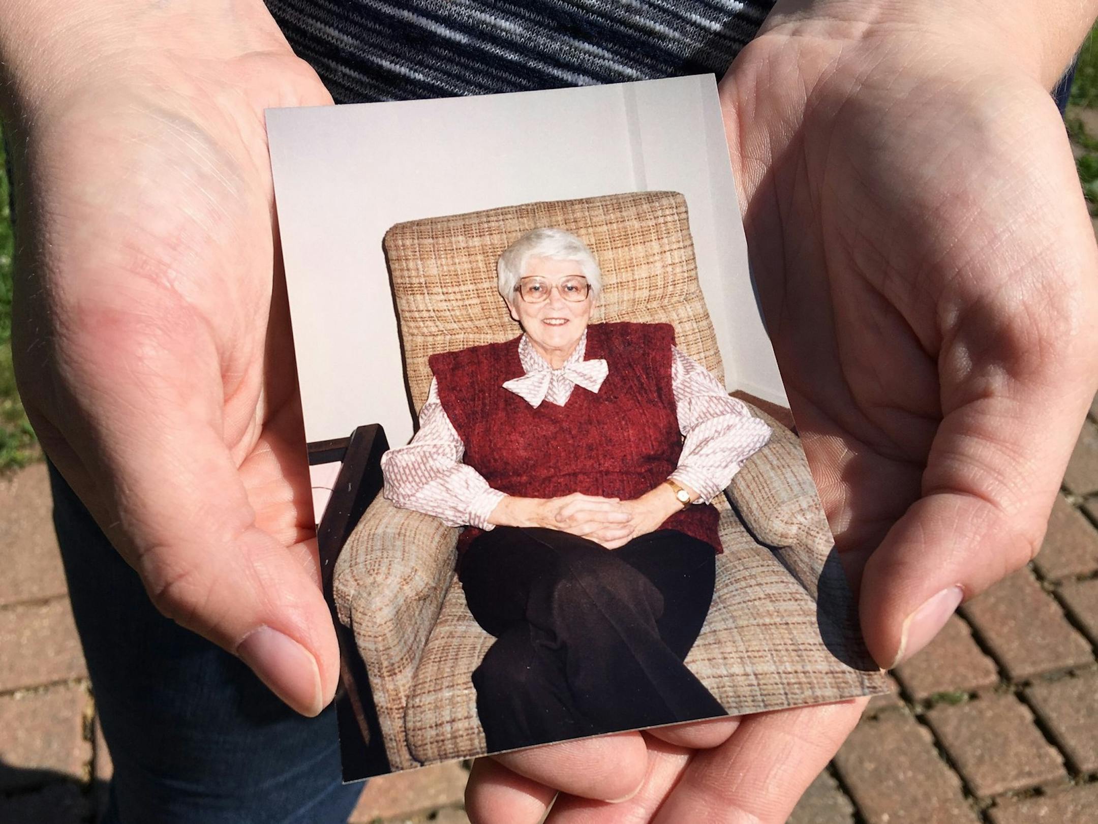 Cassie Bonstrom holds a picture of her grandmother, Nancy Jack, who died in 1989.