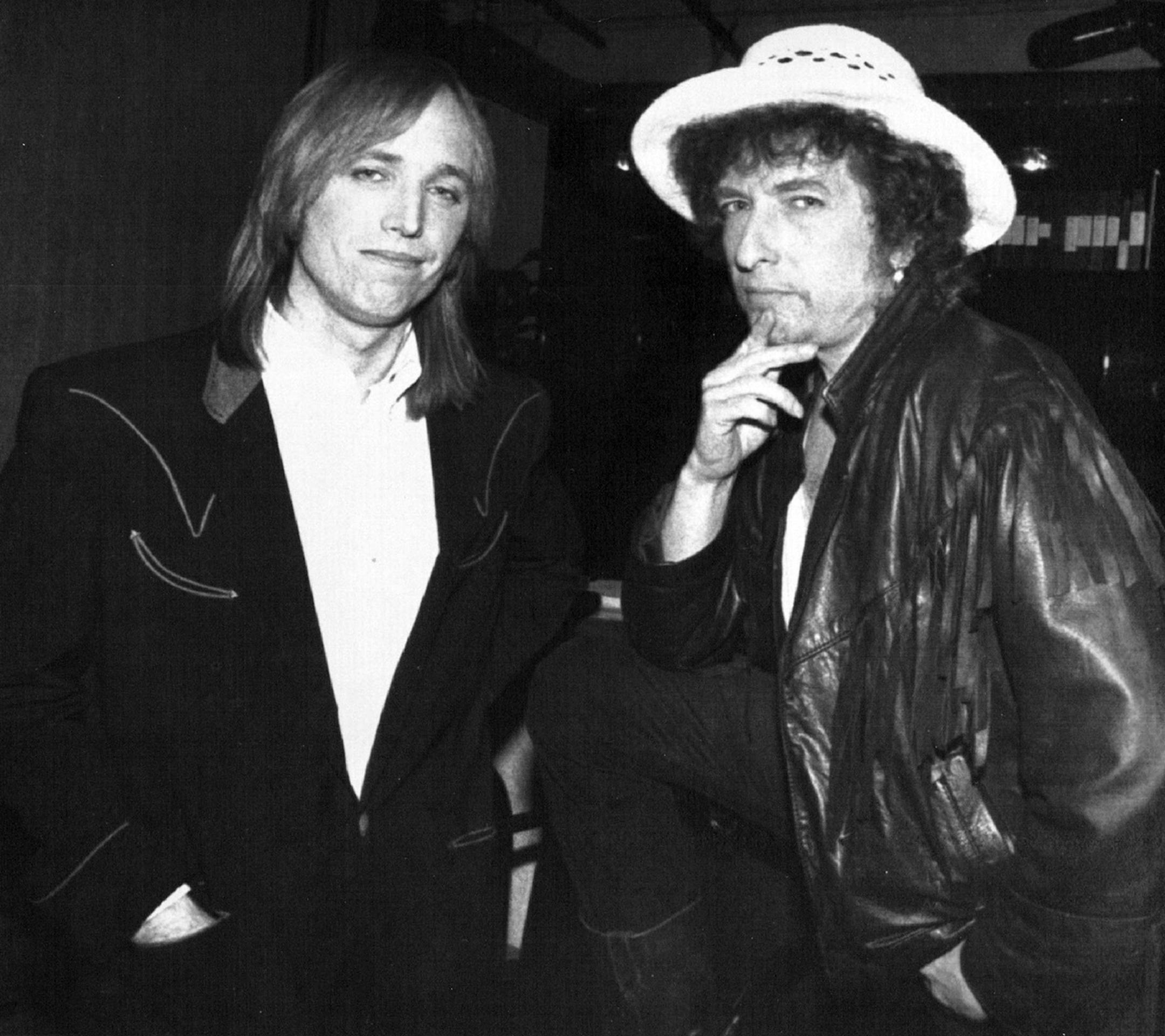 April 10, 1986 From Worldwide To Nationwide - Bob Dylan, right, and Tom Petty pose together Thursday during a press conference in Los Angeles where they announced the continuation of their "True Confessions" concert tour package will begin in the U.S. this June and will include 22 cities throughout the country.
