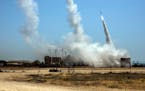 Israel’s anti-missile system in Ashkelon, Israel, fires to intercept rockets from Gaza on May 12.