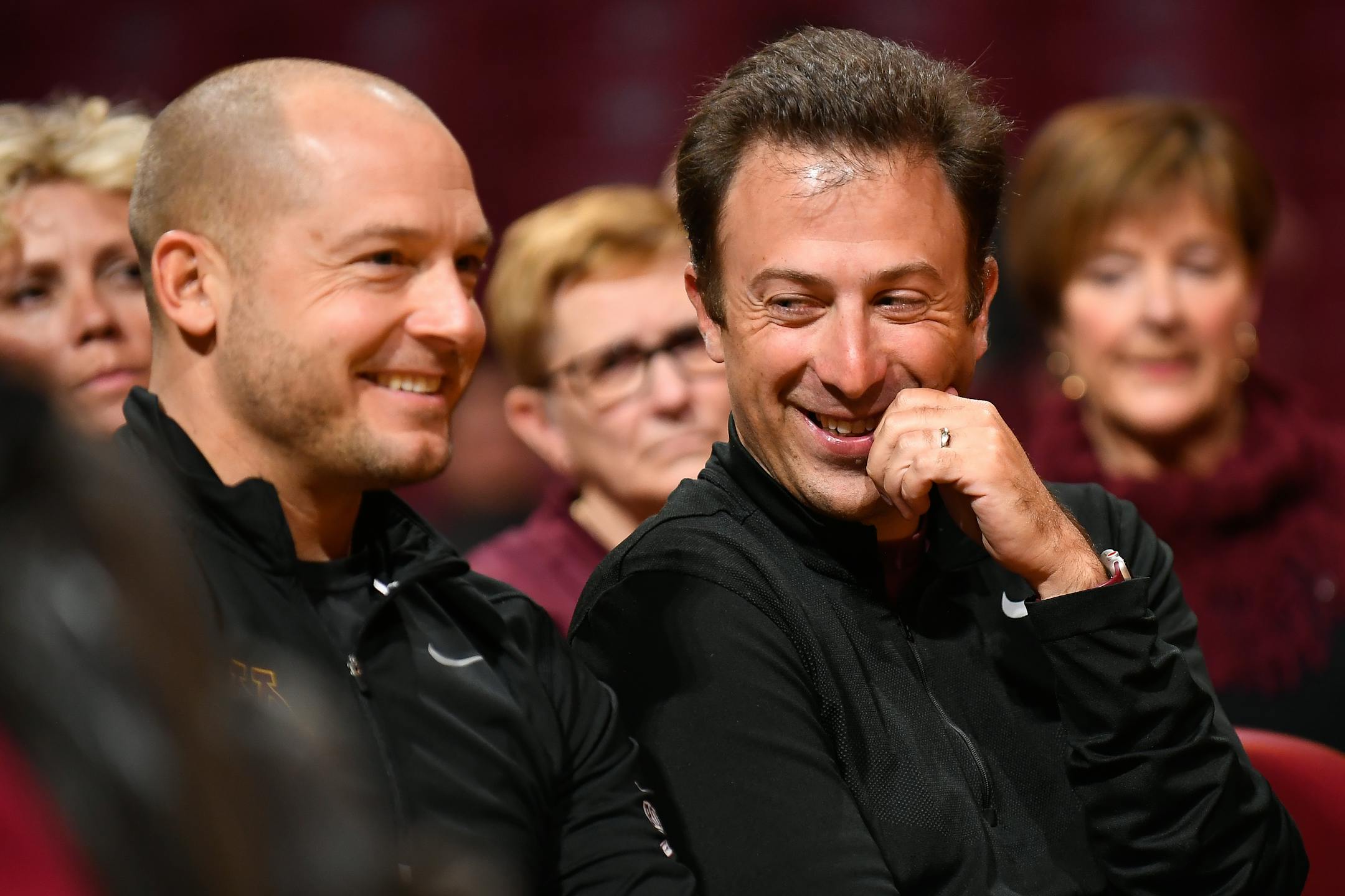 Minnesota Gophers basketball coach Richard Pitino, right, and football coach PJ Fleck laughed during a news conference introducing Lindsay Whalen as the women's basketball head coach on April 13, 2018 at Williams Arena.