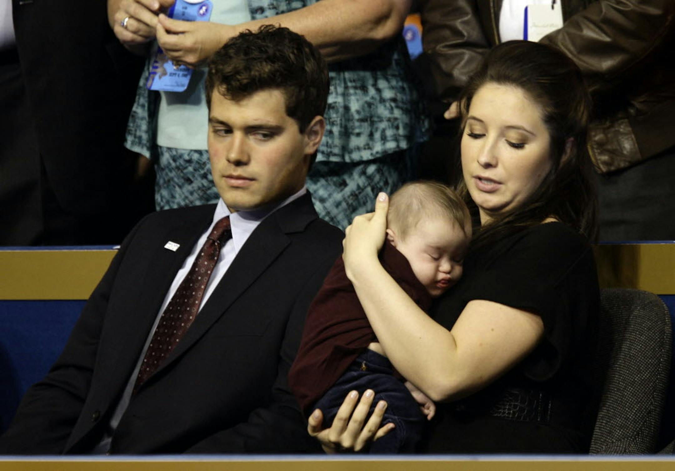 Bristol Palin, daughter of Republican Vice President candidate Sarah Palin, holds her baby brother, Trig, as her husband-to-be Levi Johnston looks on, during the Republican National Convention on Thursday.