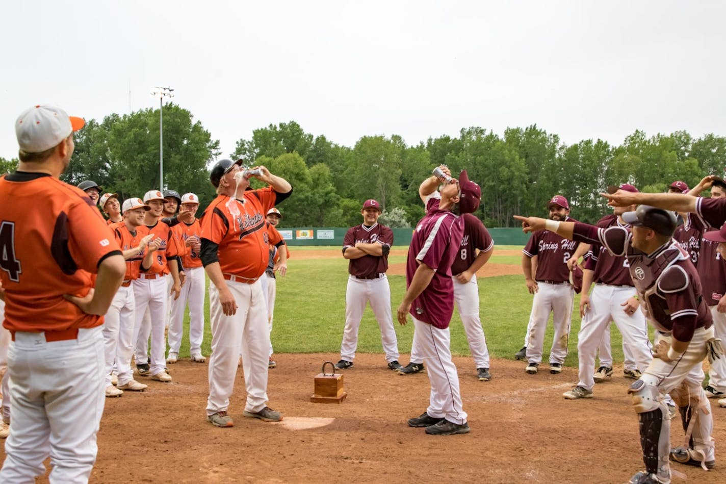 Cologne Hollanders manager Craig Pexa and Spring Hill's Gordon Barten settled a tie game by seeing who could shotgun a beer first. But there was a controversial outcome.