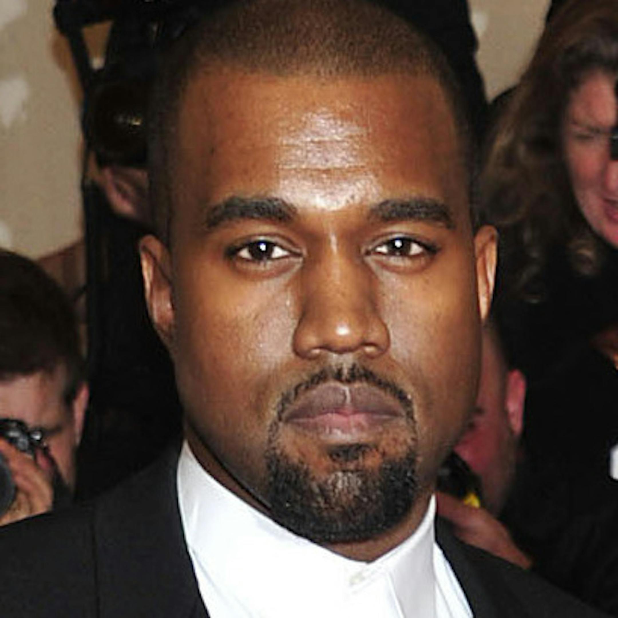 Kanye West and Kim Kardashian attends The Metropolitan Museum of Art's Costume Institute benefit celebrating "PUNK: Chaos to Couture" on Monday May 6, 2013 in New York. (Photo by Charles Sykes/Invision/AP) ORG XMIT: MIN2013052310175722