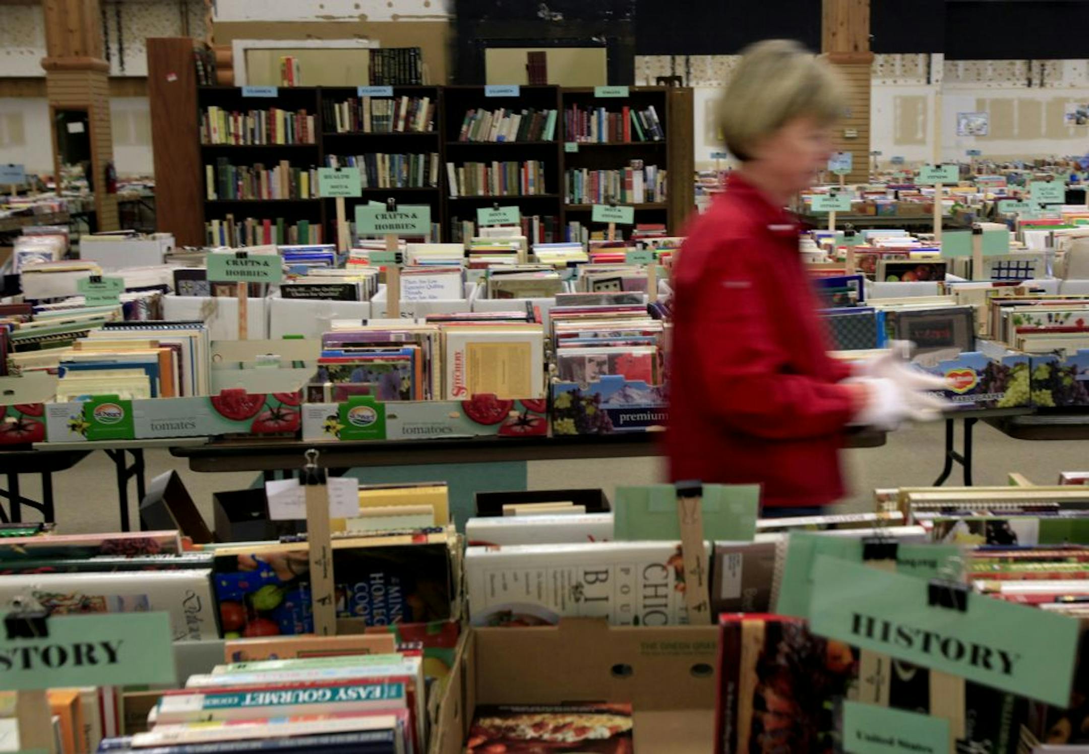 Ellen Olson of Prior Lake, MN has been a volunteer for the Book'Em used book mega-sale for the last two years which benefits a crime prevention fund. May 10, 2012.