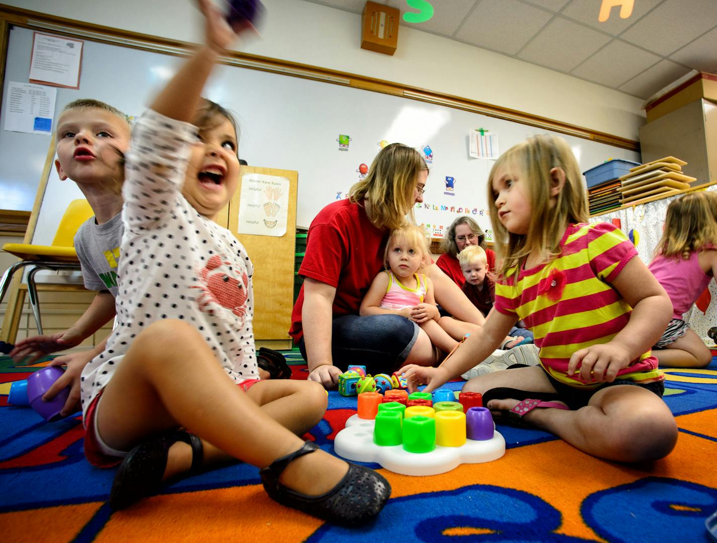 Toddlers worked with blocks. Trisha Hering, runs a Montevideo childcare program in called Kinder Kare that is at capacity with 64 children. The center is expanding to include infants in September. ] Wednesday, July 30, 2014. GLEN STUBBE * gstubbe@startribune.com