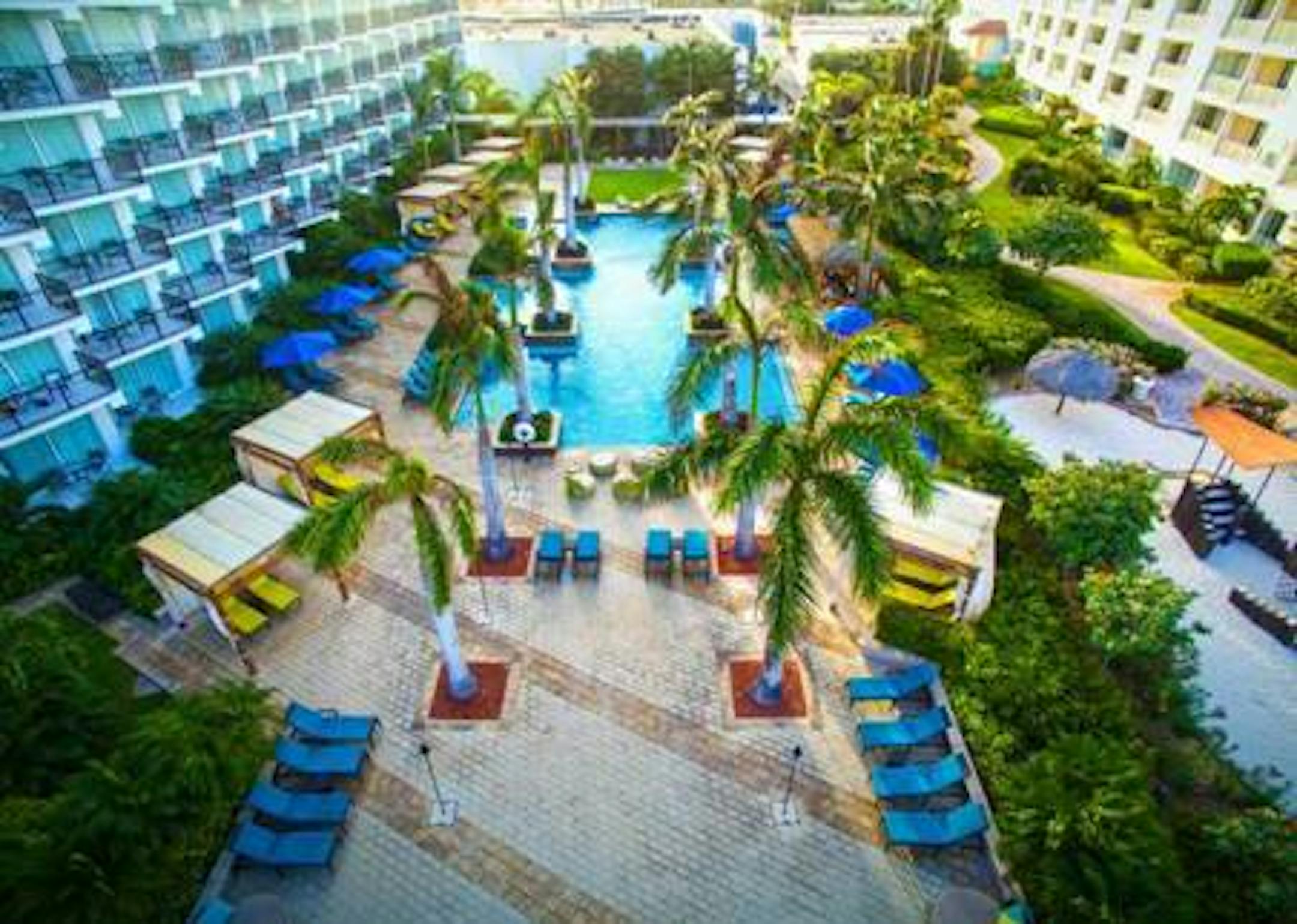 The adults-only H2Oasis pool features a long strip for swimming laps and alcoves on the sides for relaxation. The pool is surrounded by cabanas and relaxation areas and also has a bar with daily 2-for-1 happy hour specials. (Courtesy of Aruba Marriott Resort & Stellaris Casino/TNS) ORG XMIT: 1210372