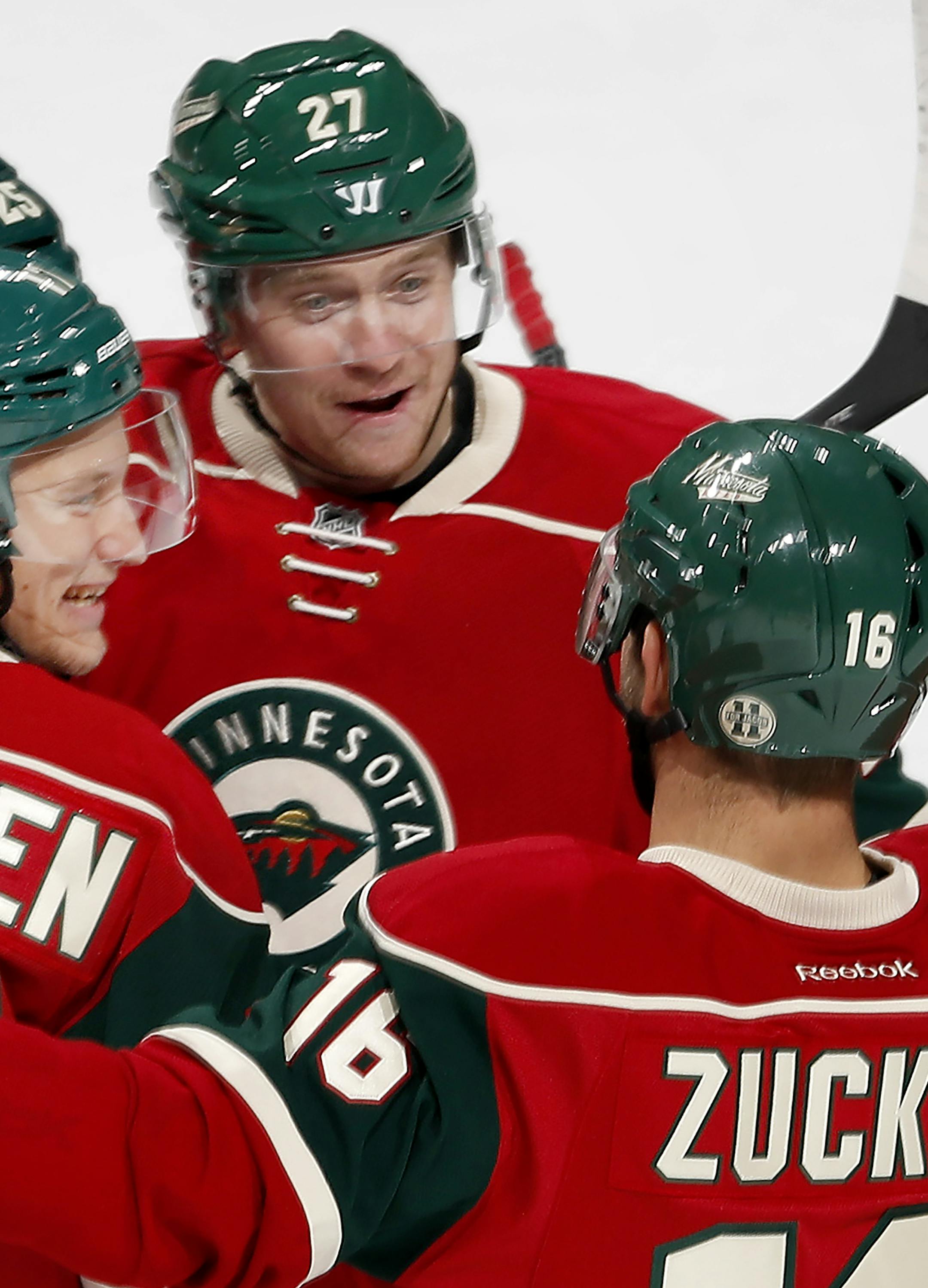 Teemu Pulkkinen (17) celebrated with teammates after scoring a goal in the second period. ] CARLOS GONZALEZ cgonzalez@startribune.com - October 18, 2016, St. Paul, MN, Xcel Energy Center, NHL, Minnesota Wild vs. Los Angeles Kings