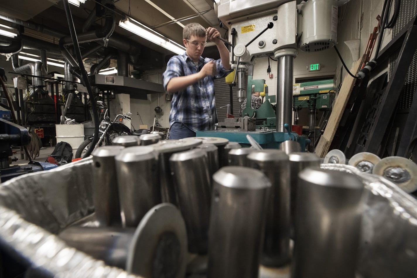 James Geist-Lindberg, a former St. Francis High School student, working in the Saints Manufacturing space last year. (JERRY HOLT/Star Tribune)