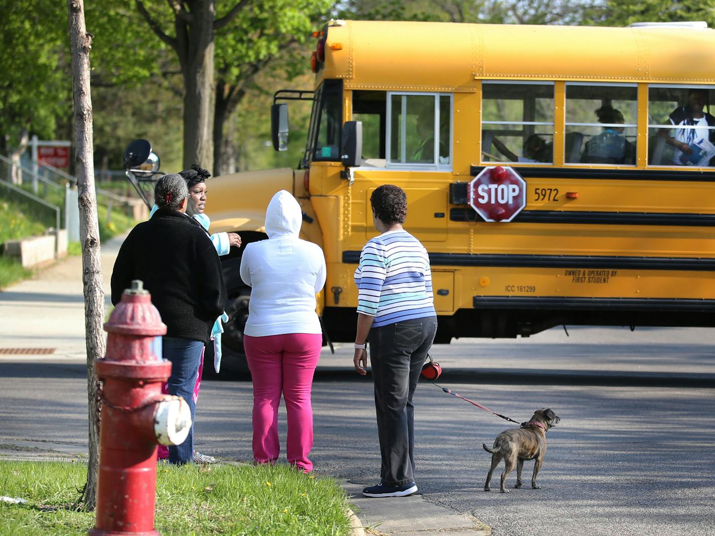 On Thursday, neighbors gathered quietly at the corner of Newton and 16th avenues N., which bore little resemblance to the chaotic scene the night before when one person was killed and seven were wounded after gunfire erupted in the area.