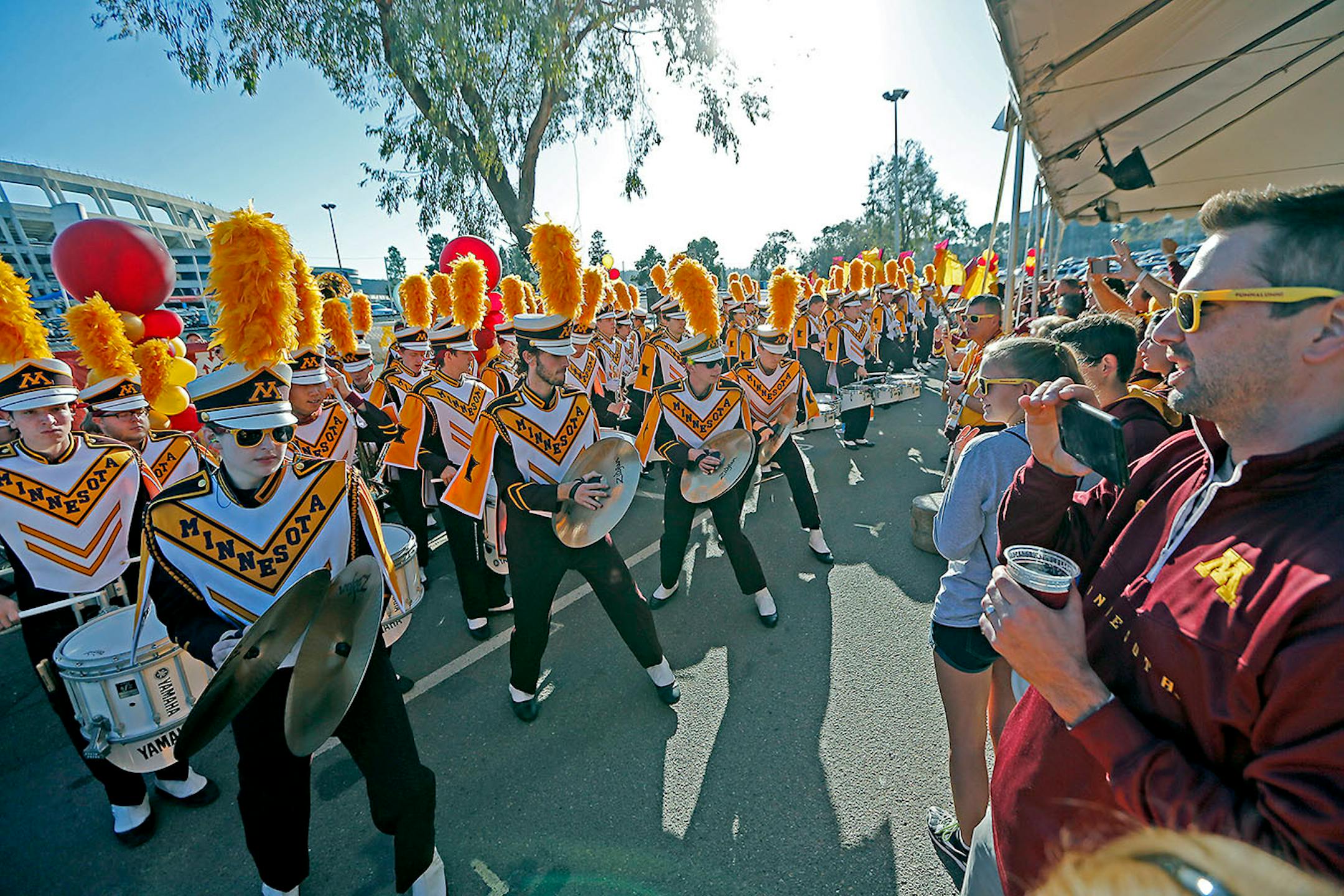 The Minnesota marching band treated the alumni fan tent with music at Qualcomm Stadium during the San Diego Holiday Bowl, Tuesday, December 27, 2016 in San Diego, CA.