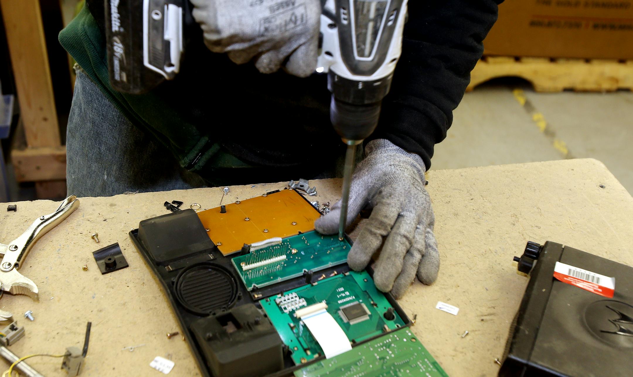 Ben Johnson disassembled a computer parts at the Tech Dump plant. ] JOELKOYAMA‚Ä¢jkoyama@startribune Golden Valley, MN on February 3, 2014. A couple of successful business guys looking to "give back," are behind a several-year-old nonprofit consumer-electronics recycling service in Golden Valley that expects this year to double the 2 million pounds of product it took in last year and double employment from 20 to 40. Tech Dump mostly hires ex-inmates and pays them up to $12 an ho