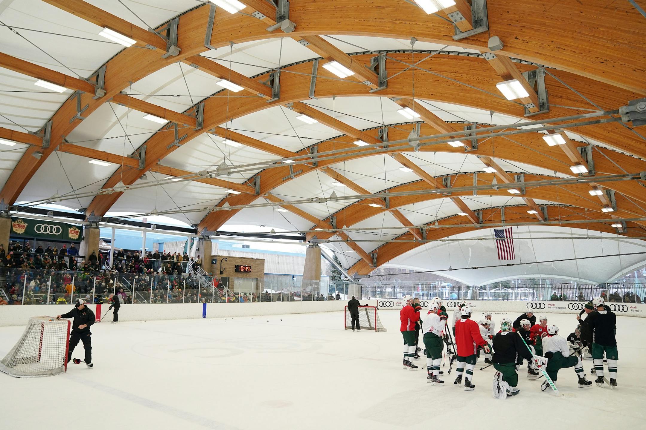 Minnesota Wild head coach Bruce Boudreau talked with his team on the ice during the Wild's outdoor practice Thursday.
