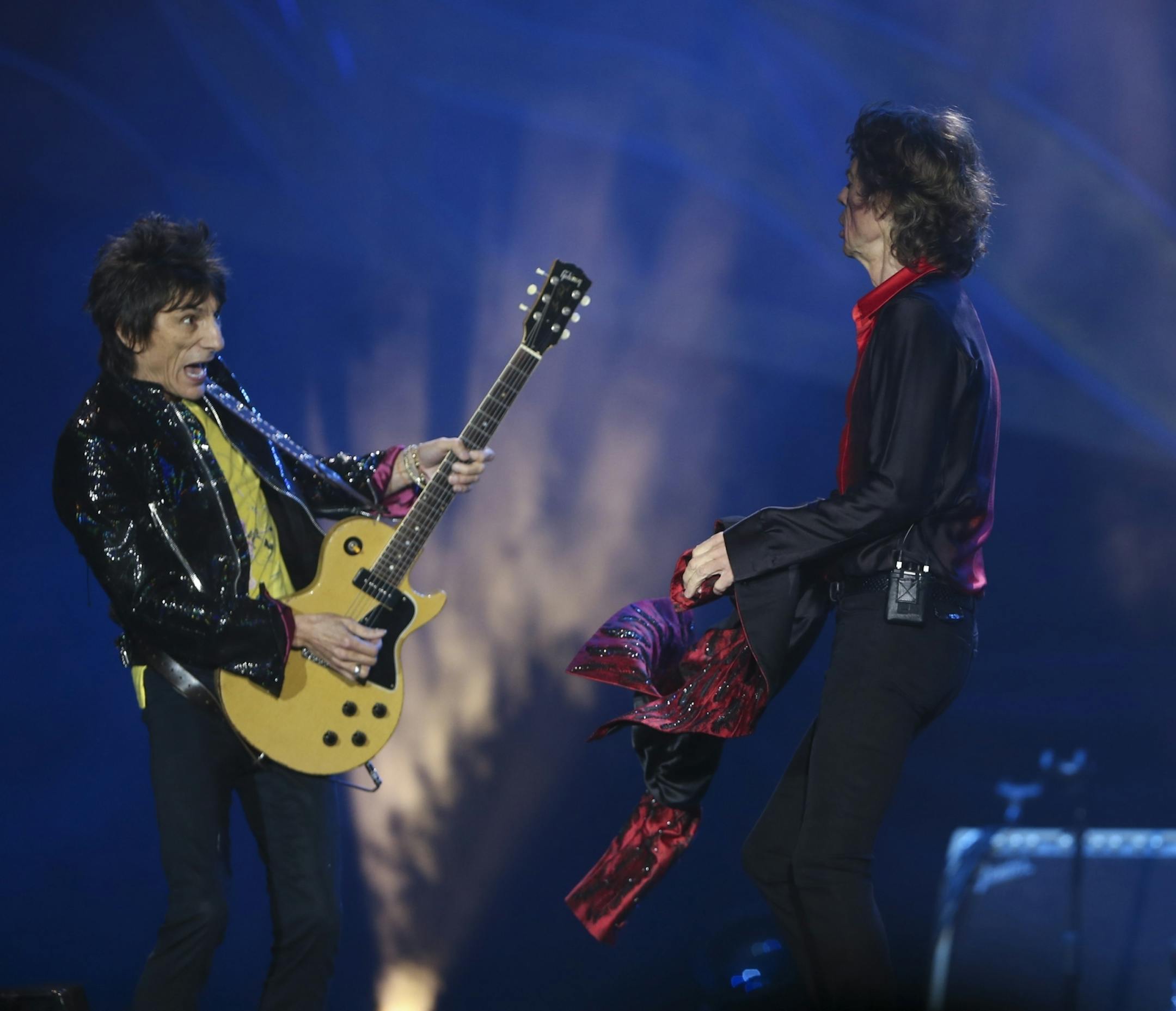 Guitarist Ron Wood reacted to Mick Jagger of the Rolling Stones at TCF Bank Stadium Wednesday night.