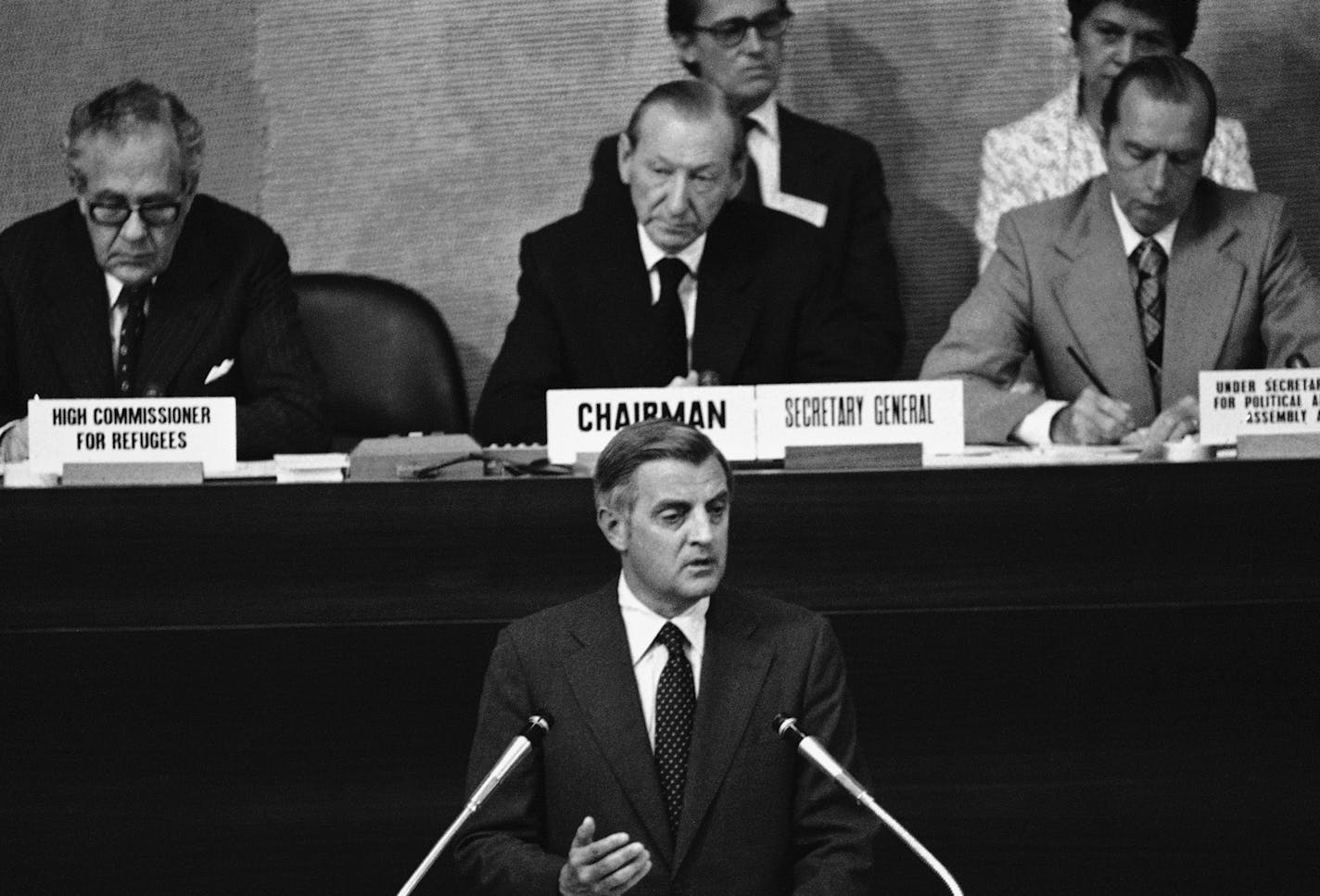 Vice President Walter Mondale delivers his address to the Indochinese refugee conference of the United Nations in the Palais de Nations in Geneva on Saturday, July 21, 1979. Comparing the plight of Indochina refugees to the "doomed Jews of Nazi Germany," Mondale pledged increased U.S. aid for the refugees and called on Vietnam to halt its "forced expulsions" of the boat people. U.N. Secretary General Kurt Waldheim, chairman of the conference, is in background. (AP Photo) ORG XMIT: APHS220167