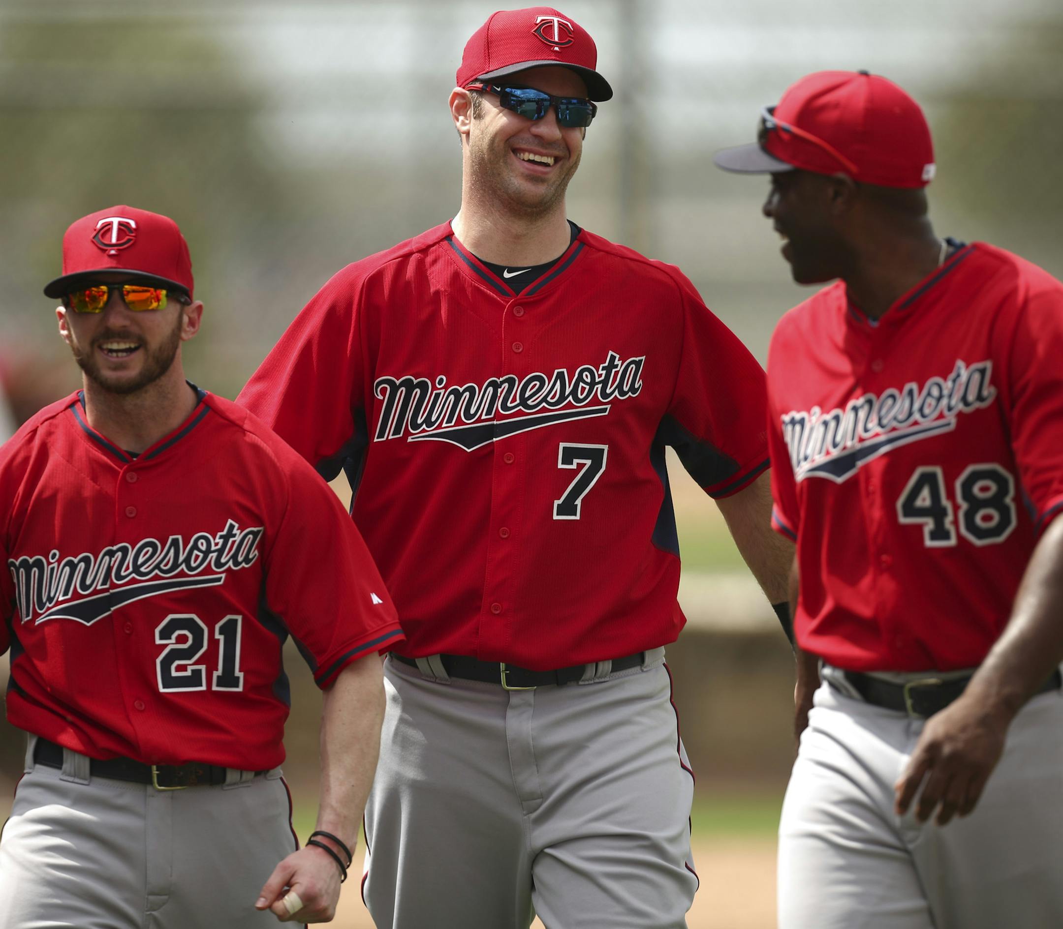 Twins outfielder Shane Robinson, first baseman Joe Mauer, and outfielder Torii Hunter, from left, all laughed as they headed to the locker room after their first full official practice Saturday afternoon at Hammond Stadium. ] JEFF WHEELER &#x2022; jeff.wheeler@startribune.com Finally, the entire Twins squad worked out at training camp on Saturday, February 28, 2015 in Fort Myers, FL.