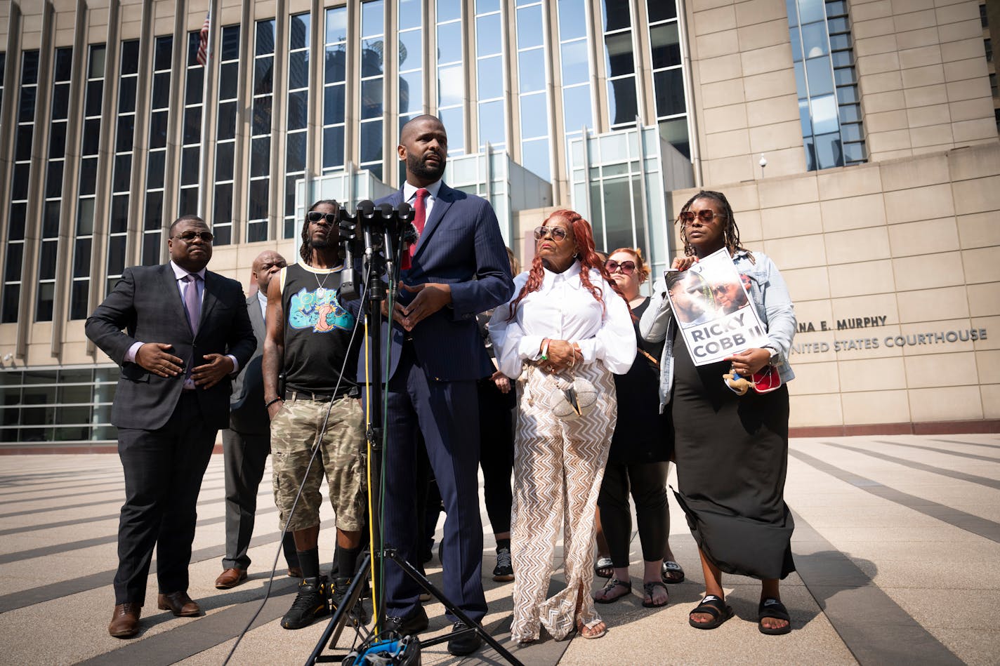 The family of Ricky Cobb II, with lawyers Bakari Sellers (center) and Attorney Harry Daniels (at left), spoke about a future lawsuit in front of the Federal Courthouse on Friday, Aug. 18, 2023 in Minneapolis, Minn. ] RENEE JONES SCHNEIDER • renee.jones@startribune.com