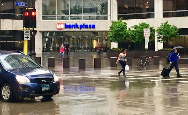 Wednesday was another wet one for folk moving about in downtown Minneapolis.