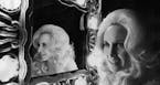 March 24, 1975 Tammy Wynette at the dressing - room mirror aboard her $125,000 bus. Once a year Tammy Wynette mails $6 to the state of Alabama so she 
