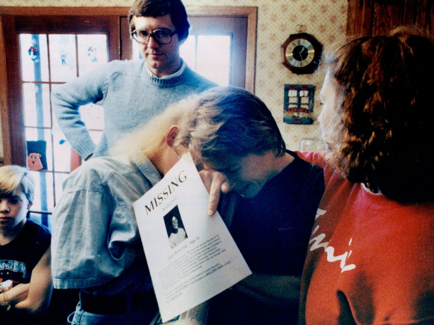 October 23, 1989 Jerry Wetterling watches in dispair as his wife Patty breaks down in tears upon seeing the missing persons poster of abducted 11-year-old son Jacob that Volunteers began spreading throughout the state and nation Monday afternoon Jacob was abducted from a country road near his home at 29422 Kiwi Court in St. Joseph, MN at about 9:15 Sunday evening . (The two young women comforting Mrs. Wetterling are Shannon Brannan, right, a former foster daughter of the Wetterlings and Lisa Ove