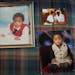 Jacob Mayson, left, now 8, Benzel Mayson, 2, and a photo of their mother and father, Jacob Mayson and Bernice Sulomna. The younger Jacob, Benzel and B