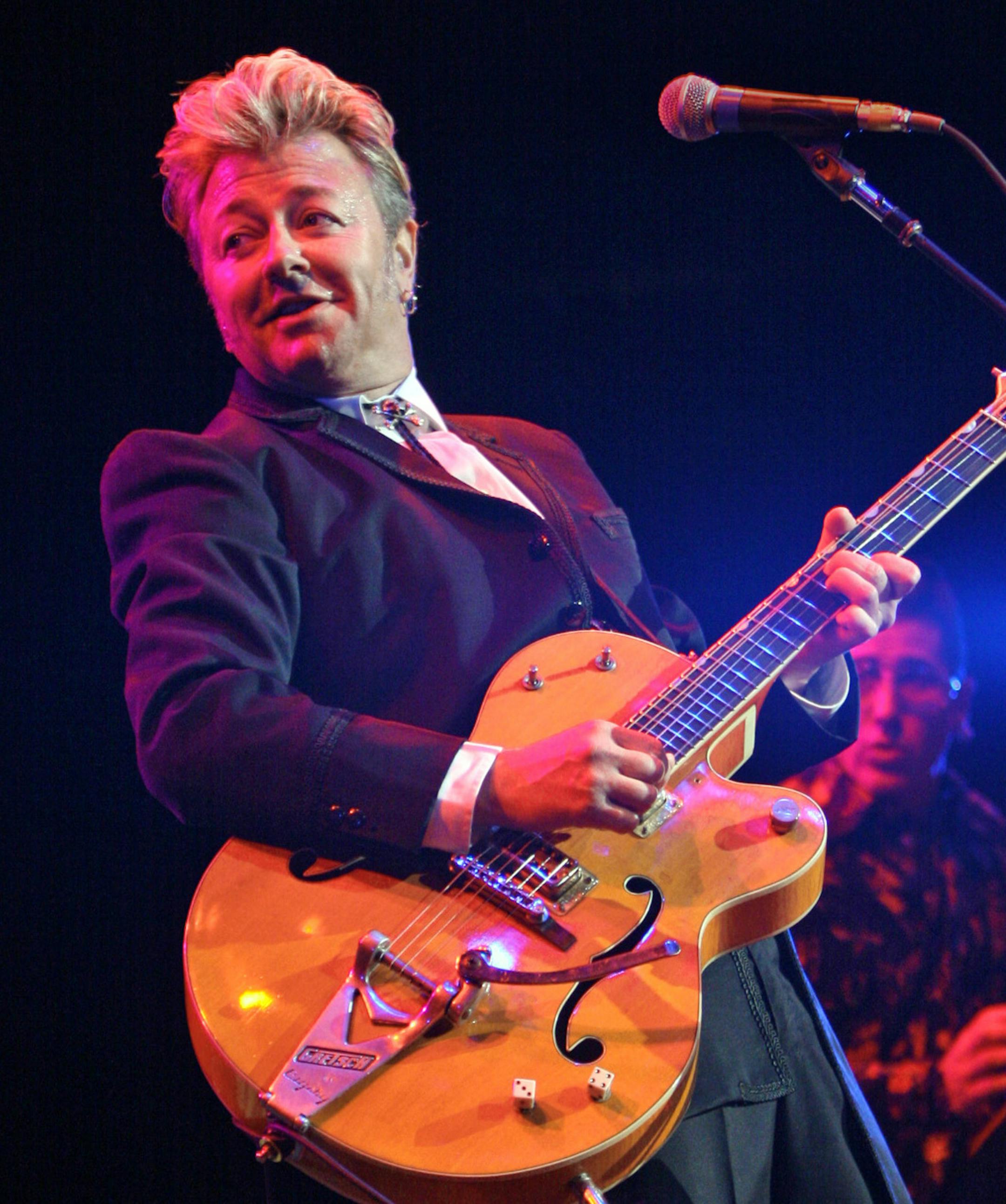 TOM SWEENEY &#x2022; tsweeney@startribune.com St. paul, MN 7/28/2007 FILE for future use, Mpls resident Brian Setzer, playing with the re-united ' Stray Cats', ( Lee Rocker , bass- basckground right) at Xcel center as part of the ' Jackfest' tour. ORG XMIT: MIN2013071013420978