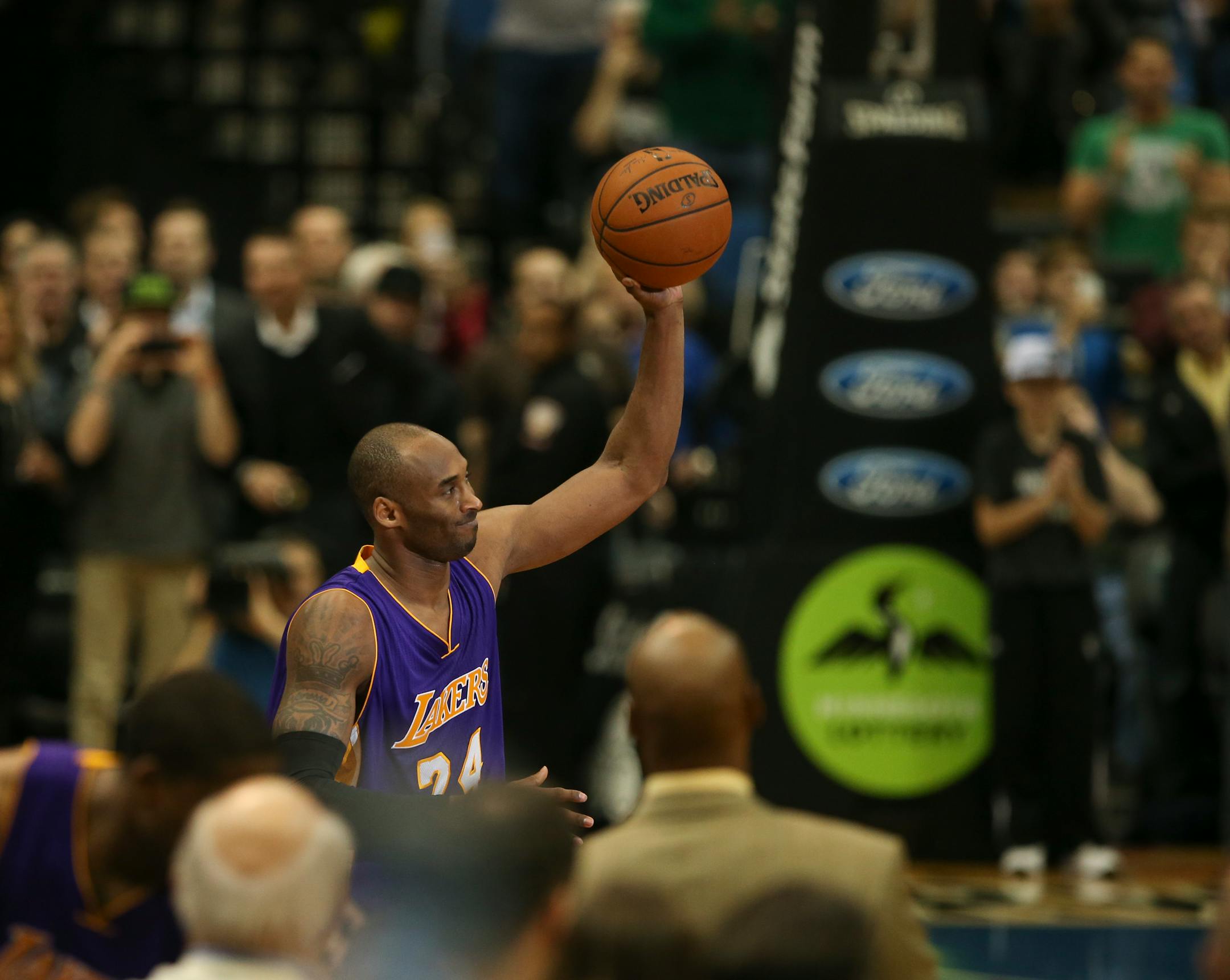 Kobe Bryant acknowledged the crowd after he was presented with the game ball after moving past Michael Jordan on the all time scorers list in the second quarter Sunday night at Target Center in Minneapolis.