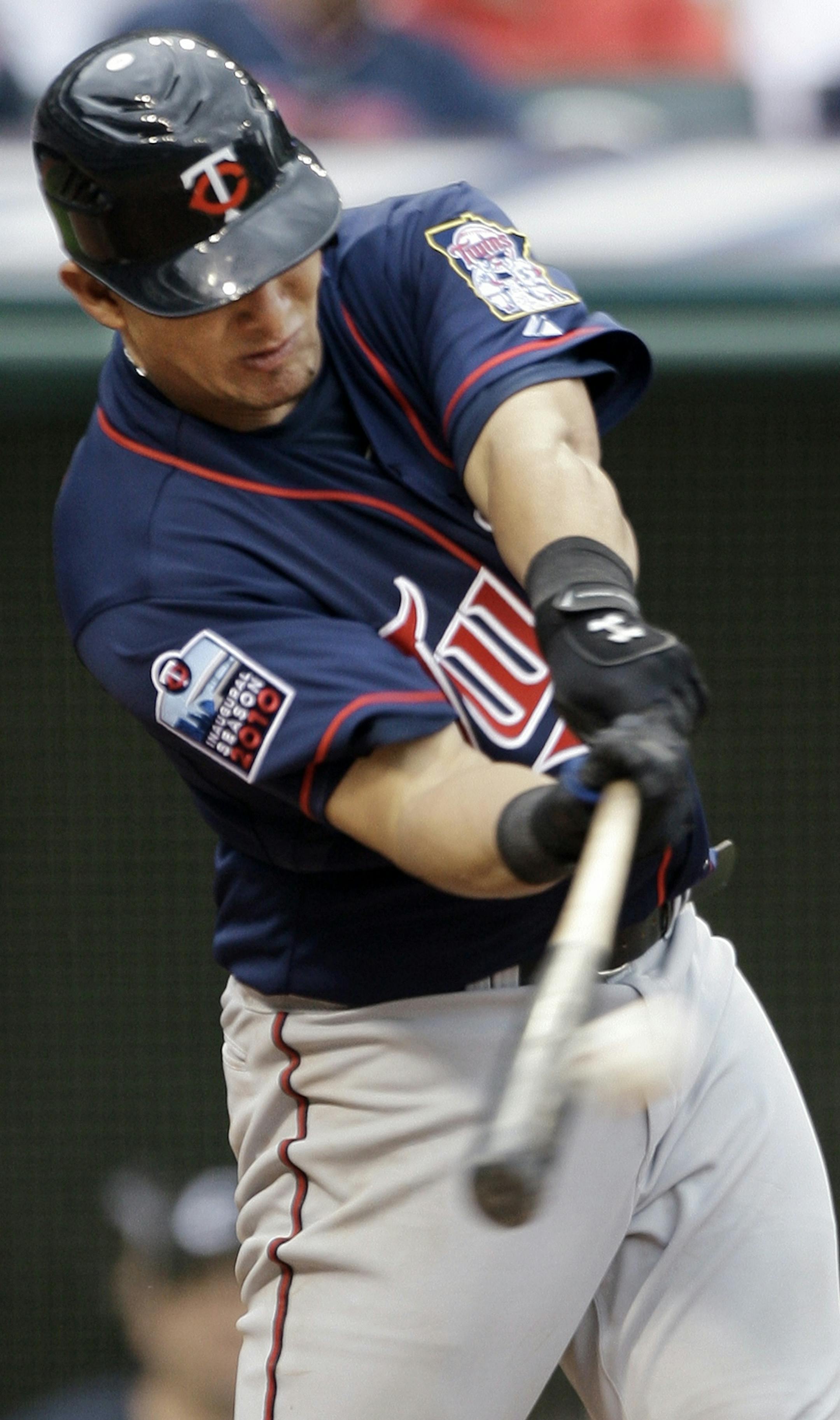 Minnesota Twins' Wilson Ramos doubles off Cleveland Indians relief pitcher Hector Ambriz in the ninth inning of a baseball game Sunday, May 2, 2010, in Cleveland. Ramos went 4 for 5 in his major league debut and the Twins won 8-3. (AP Photo/Mark Duncan) ORG XMIT: MIN2015061420410473