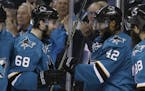 San Jose Sharks' Joel Ward (42) celebrates his goal with teammate Melker Karlsson (68) during the second period in Game 6 of the NHL hockey Stanley Cu
