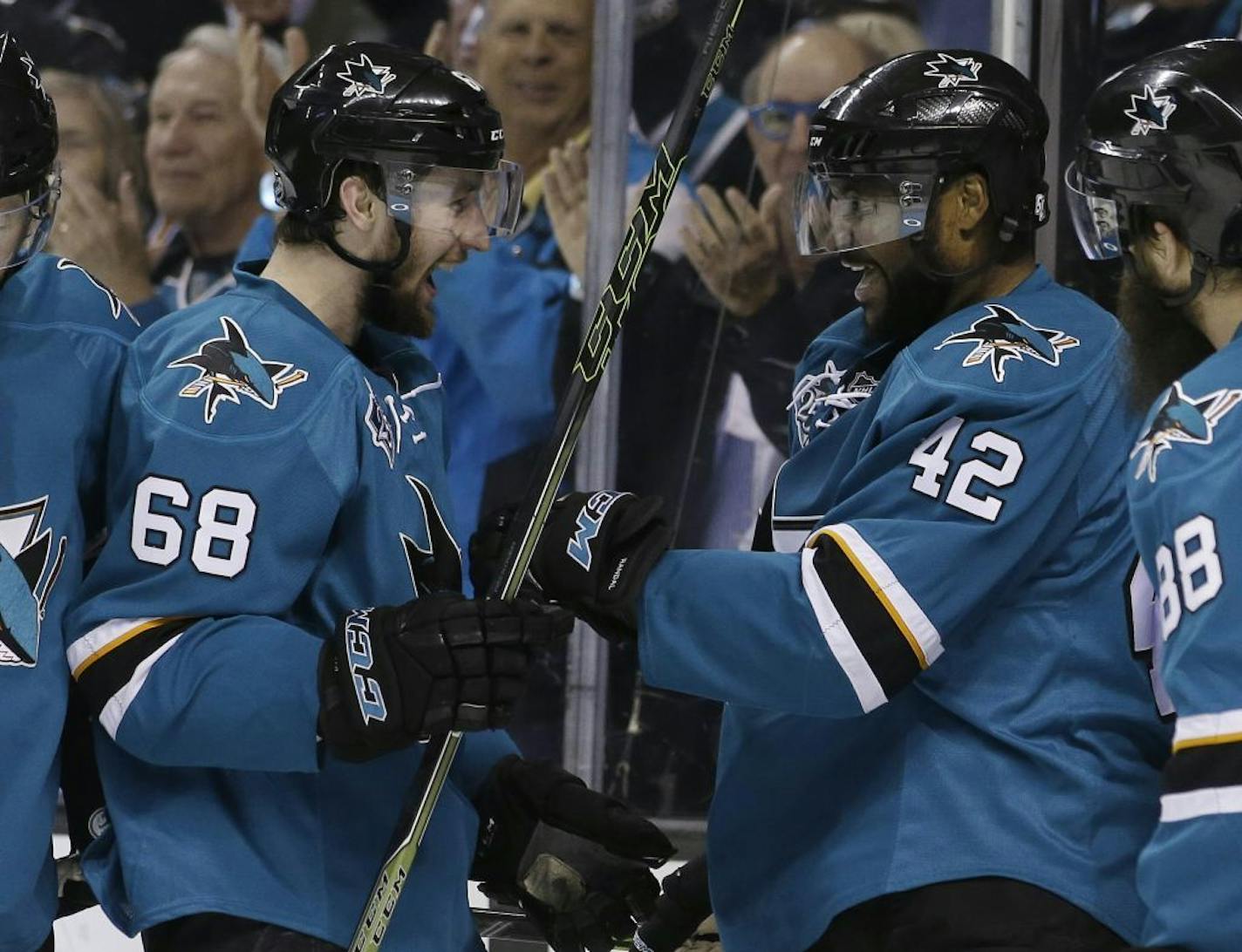 San Jose Sharks' Joel Ward (42) celebrates his goal with teammate Melker Karlsson (68) during the second period in Game 6 of the NHL hockey Stanley Cup Western Conference finals against the St. Louis Blues Wednesday, May 25, 2016, in San Jose, Calif.