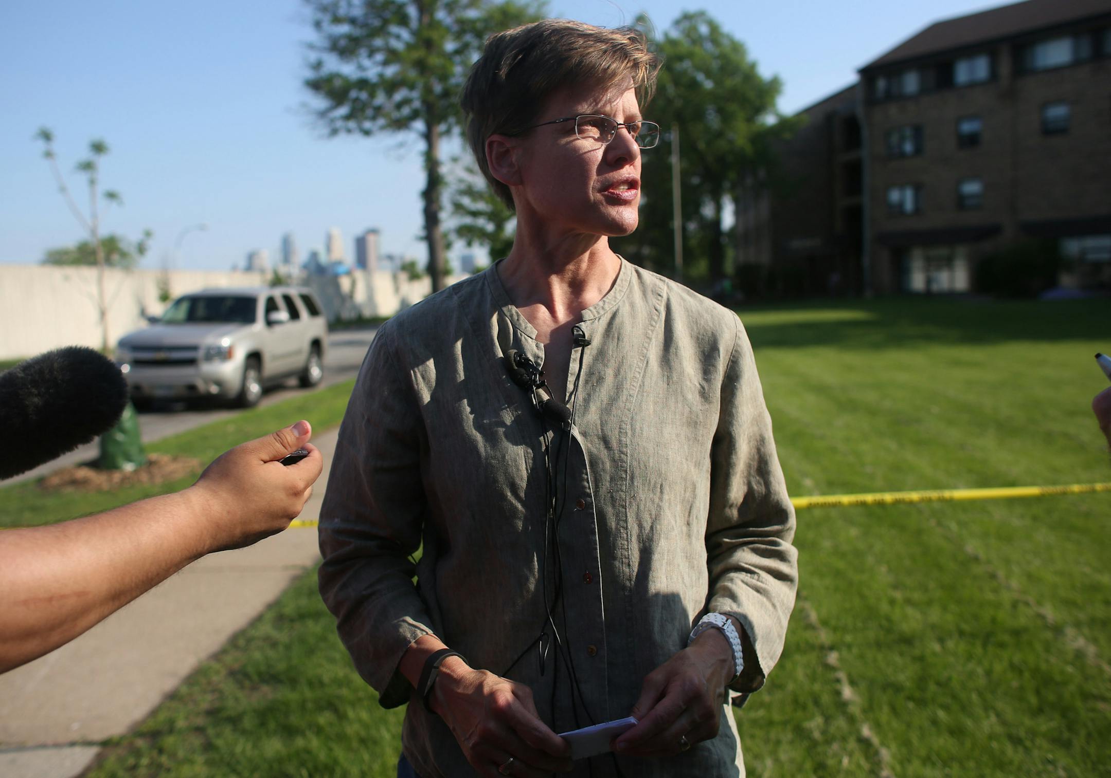 Minneapolis deputy chief of investigations Kris Arneson gave a preliminary report about a foot chase that left one suspect shot another injured and an officer injured. ] (KYNDELL HARKNESS/STAR TRIBUNE) kyndell.harkness@startribune.com Shooting in North Minneapolis, Min. Friday, May 30, 2014.