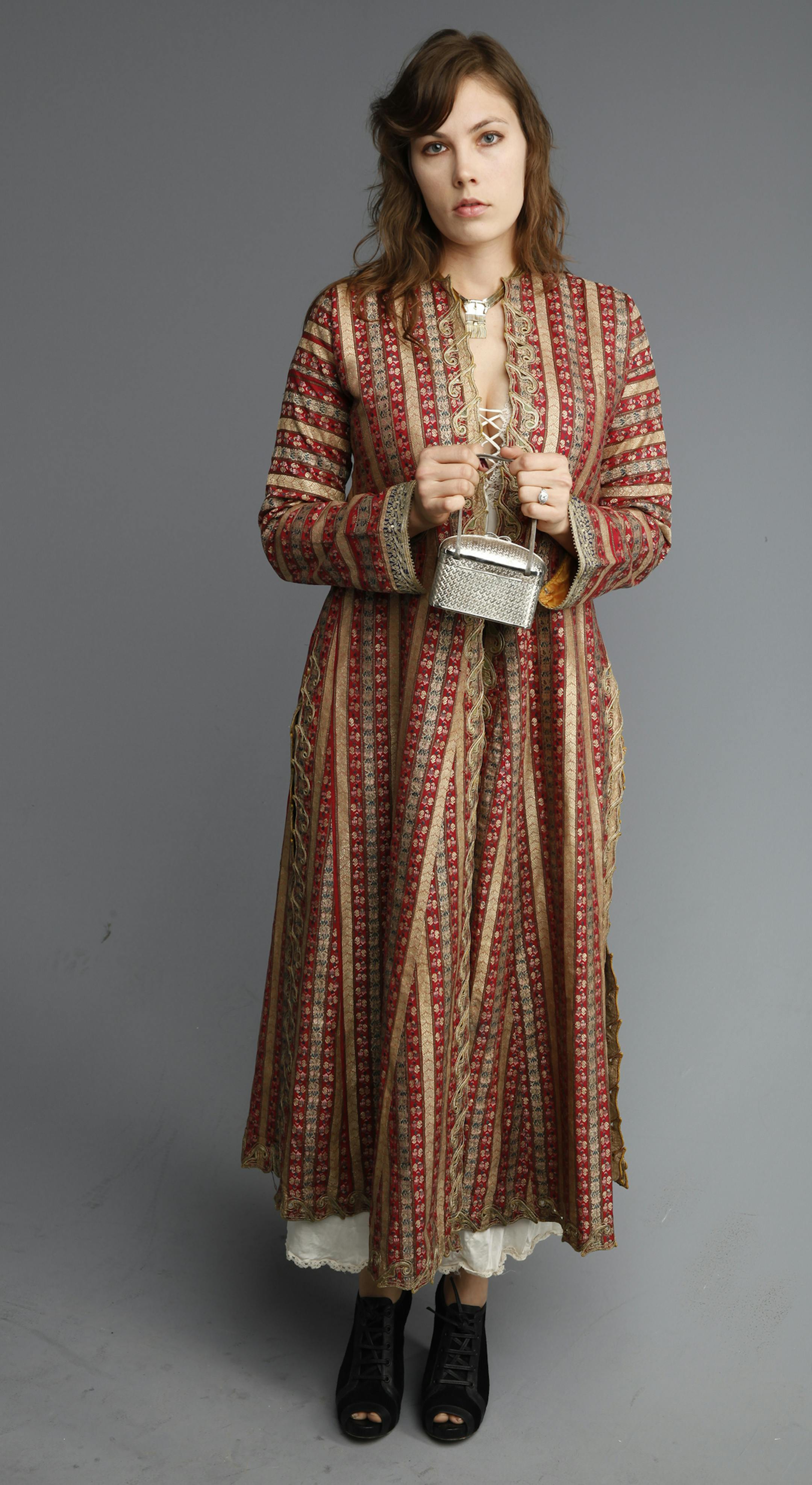 Caitlin Karolczak models an outfit of high-end finds from estate sales and top-tier consignment storesThe worlds of finance and fashion have bonded in a new way. The market for secondhand clothing and accessories is booming, even among the most stylish people. ].Richard Tsong-Taatarii/rtsong- taatarii@startribune.com