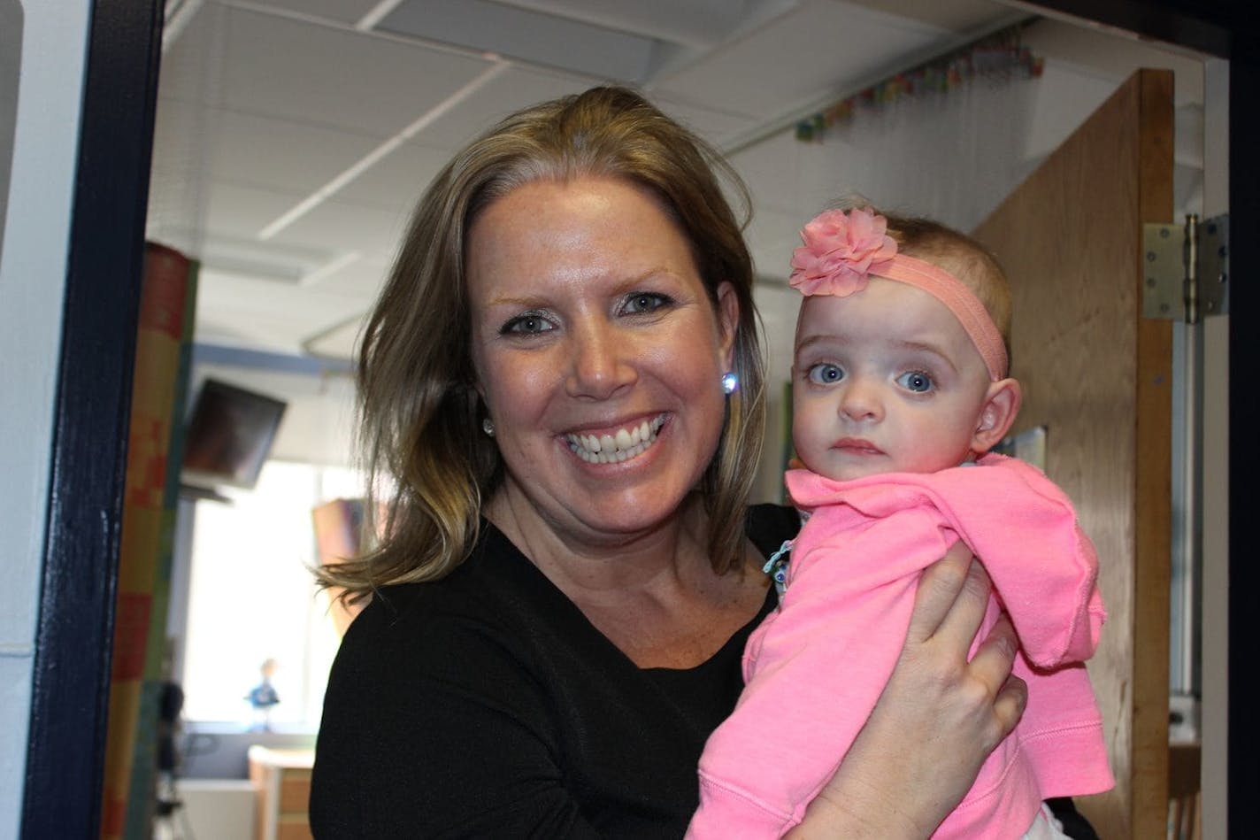 Liz Smith with her daughter Gisele, who was 9 months old when Smith brought her home from the hospital.