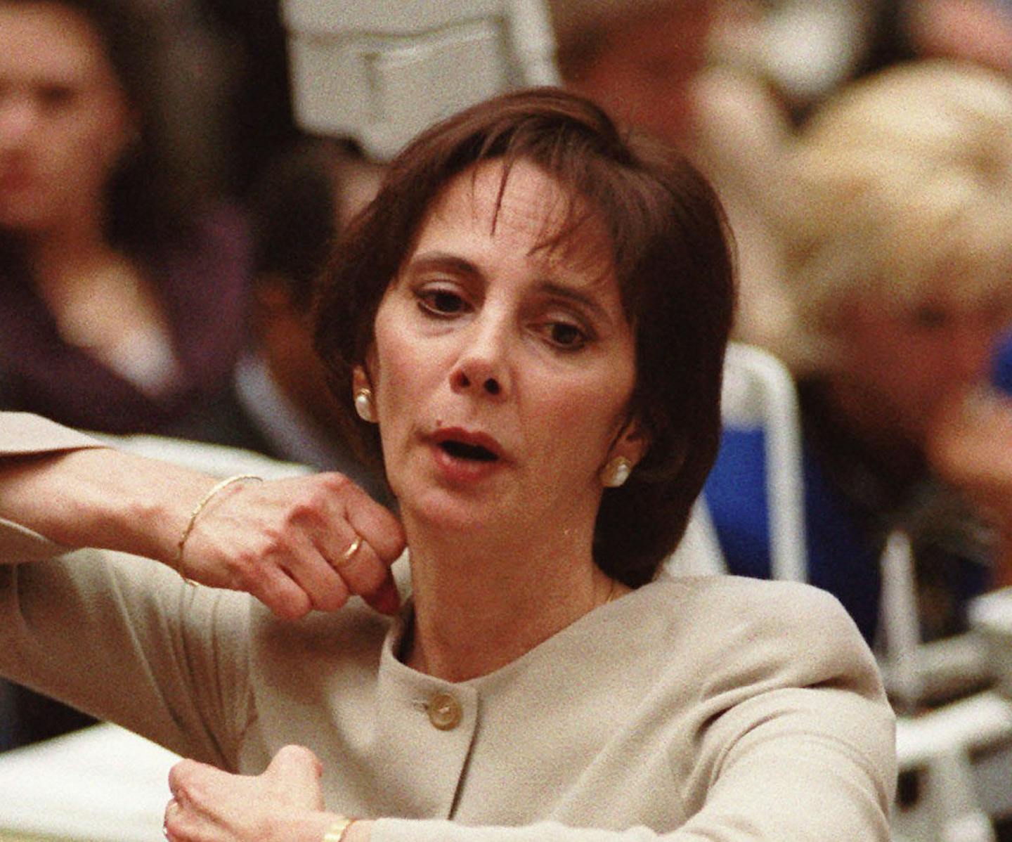 Prosecutor Marcia Clark demonstrates to the jury how the murders were committed Tuesday, Sept. 26, 1995, during her closing arguments in the O.J. Simpson double-murder trial in Los Angeles.