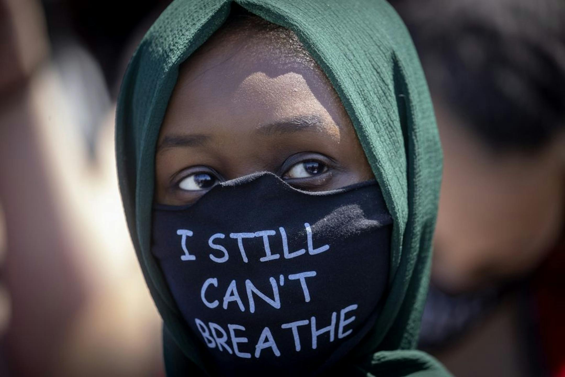 Hundreds continued to gather at the corner where George Floyd was killed by a Minneapolis police officer at Chicago and 38th Street, Sunday, May 31, 2020 in Minneapolis.