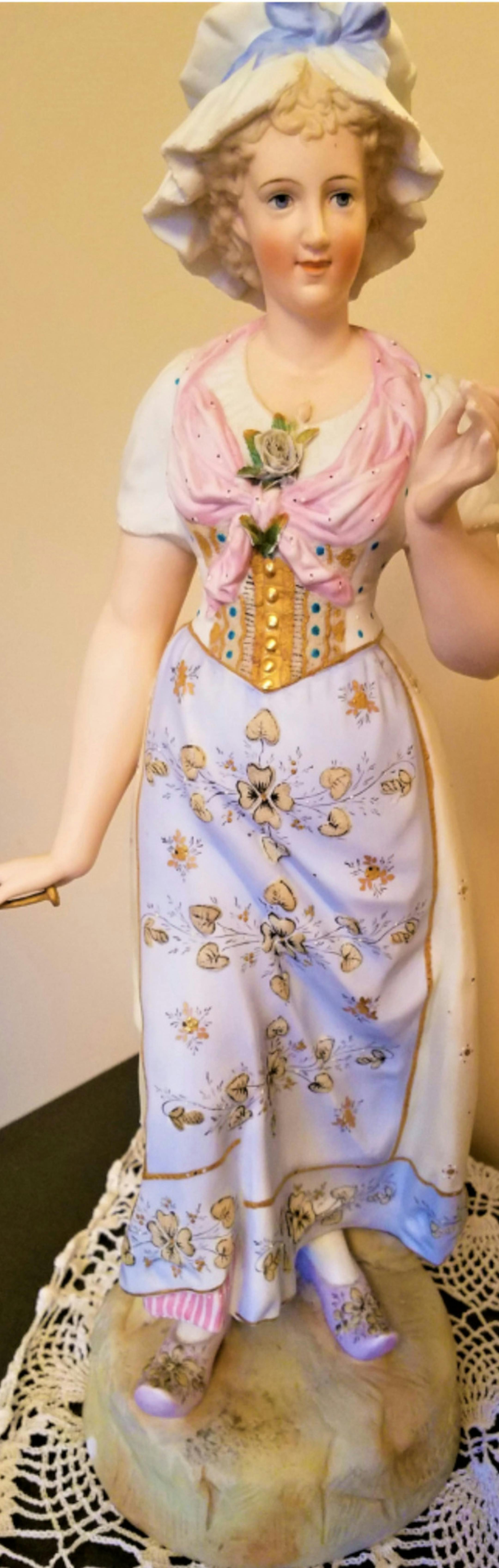 This pair of bisque figures were made in Germany, but exactly where is a mystery. (Handout/TNS) ORG XMIT: 1214217