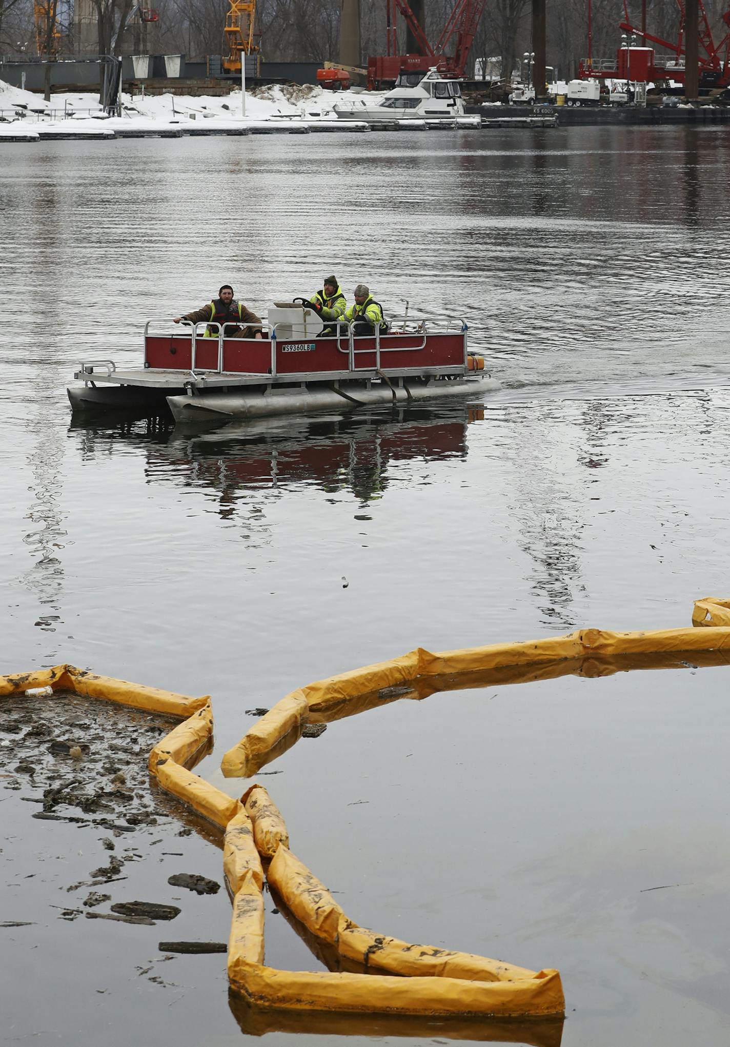 Workers on the Levee Park project are putting in longer shifts to add sheet piling on the water front area. The buoys are to control spills from the construction zone. ] In an effort to get ahead of any possible flooding, extra work crews have been added to the Hwy 63 bridge construction project from Red Wing to Wisconsin, and workers on the Levee Park project are working longer shifts to add sheet piling. RICHARD TSONG-TAATARII &#xa5; richard.tsong-taatarii@startribune.com