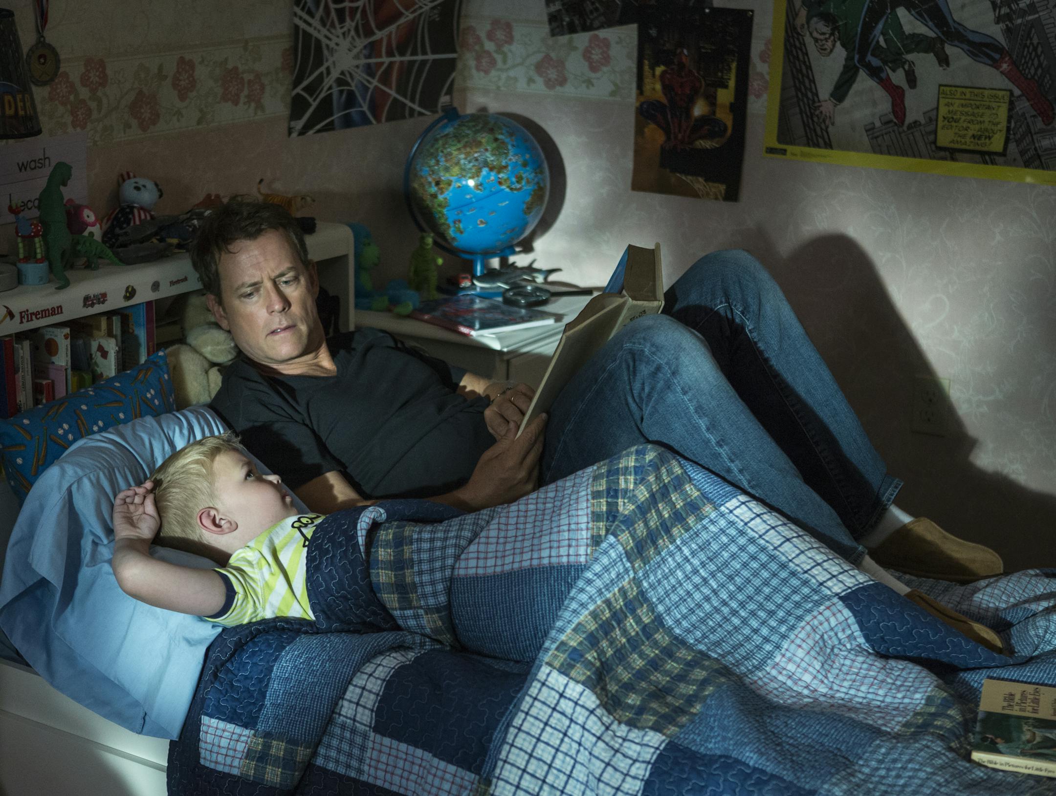 This image released by Sony Pictures shows Connor Corum, left, and Greg Kinnear in a scene from "Heaven Is For Real." (AP Photo/Sony Pictures, Allen Fraser)