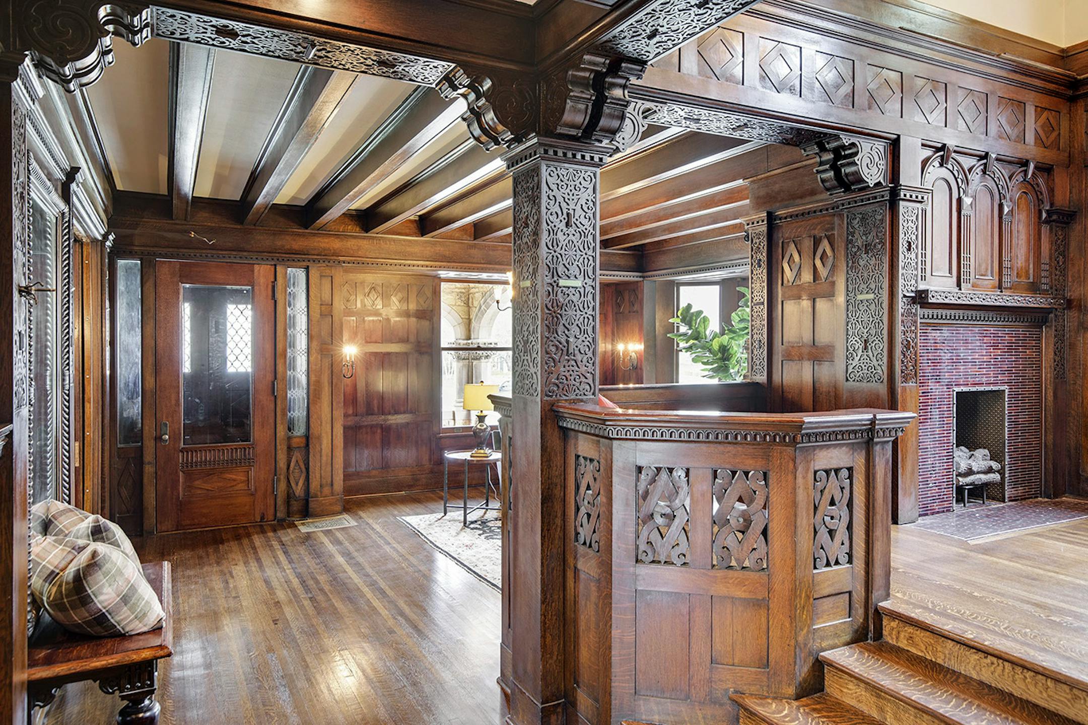 The home's original hand-carved woodwork has been restored to its former luster.