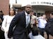 Minnesota Vikings running back Adrian Peterson leaves the courthouse with his wife Ashley Brown Peterson Tuesday, Nov. 4, 2014, in Conroe, Texas. Adri