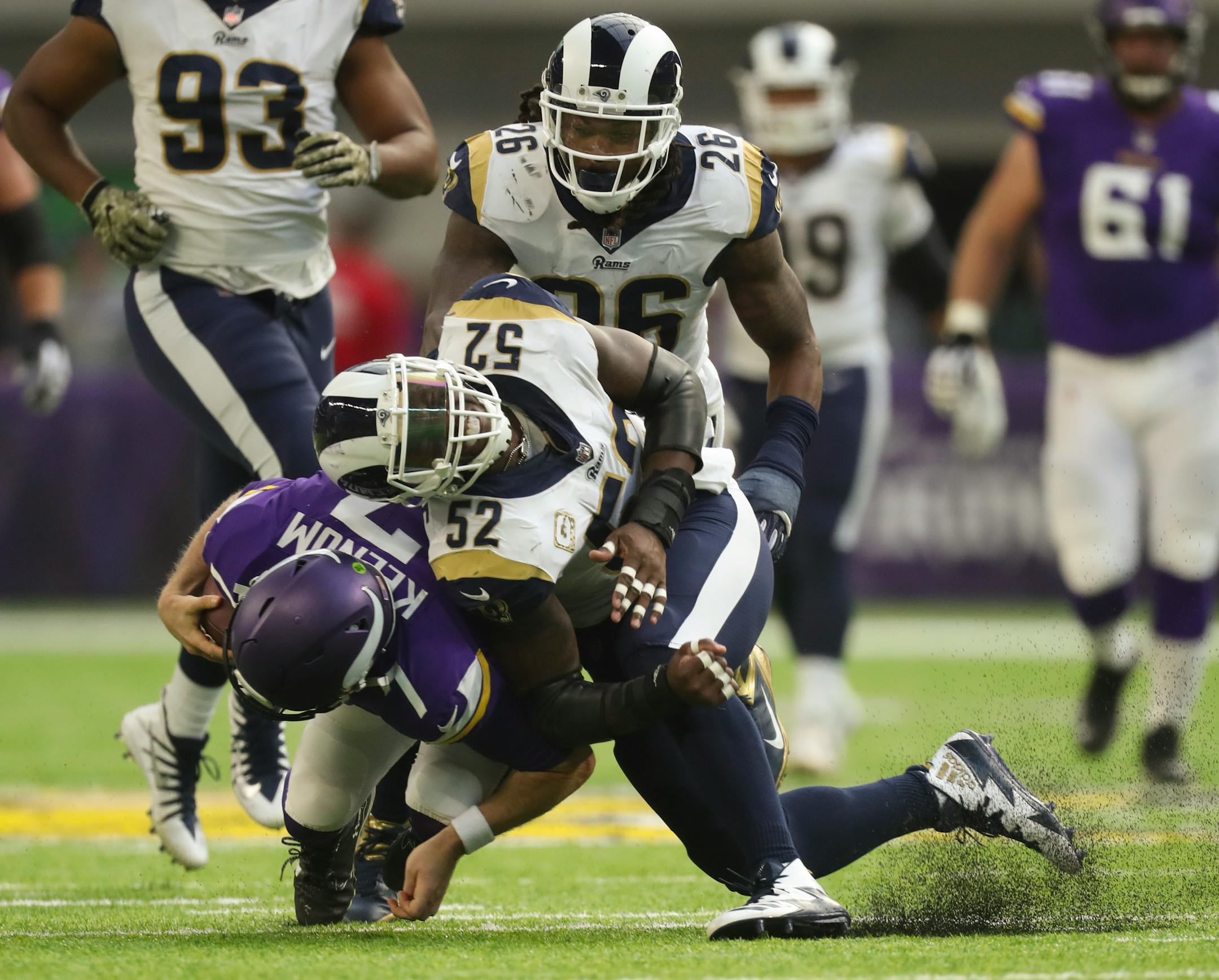 Minnesota Vikings quarterback Case Keenum (7) scrambled for a 14 yard gain in the second quarter before being stopped by Los Angeles Rams inside linebacker Alec Ogletree (52).