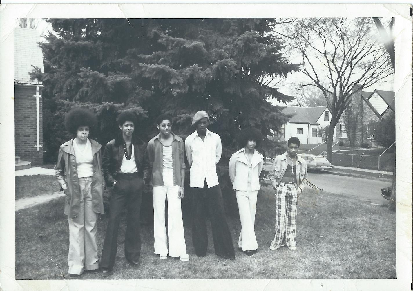 The historic Grand Central Band, featuring (left to right) Linda Anderson, Andre Cymone, Morris Day, Terry Jackson, Prince and William "Hollywood" Doughty, in the mid-1970s. According to Jackson, the picture was taken at his family's house in north Minneapolis — next door to the Anderson home (behind the pine tree), where Prince lived with Cymone for a time — by Charles Chamblis, the noted photographer who chronicled the Twin Cities black community in the 1970s-80s.