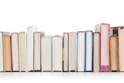Stack of books isolated on a white background BY THE BOOK SOLUTION FOR SOUTHDALE MALL