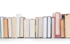 Stack of books isolated on a white background BY THE BOOK SOLUTION FOR SOUTHDALE MALL