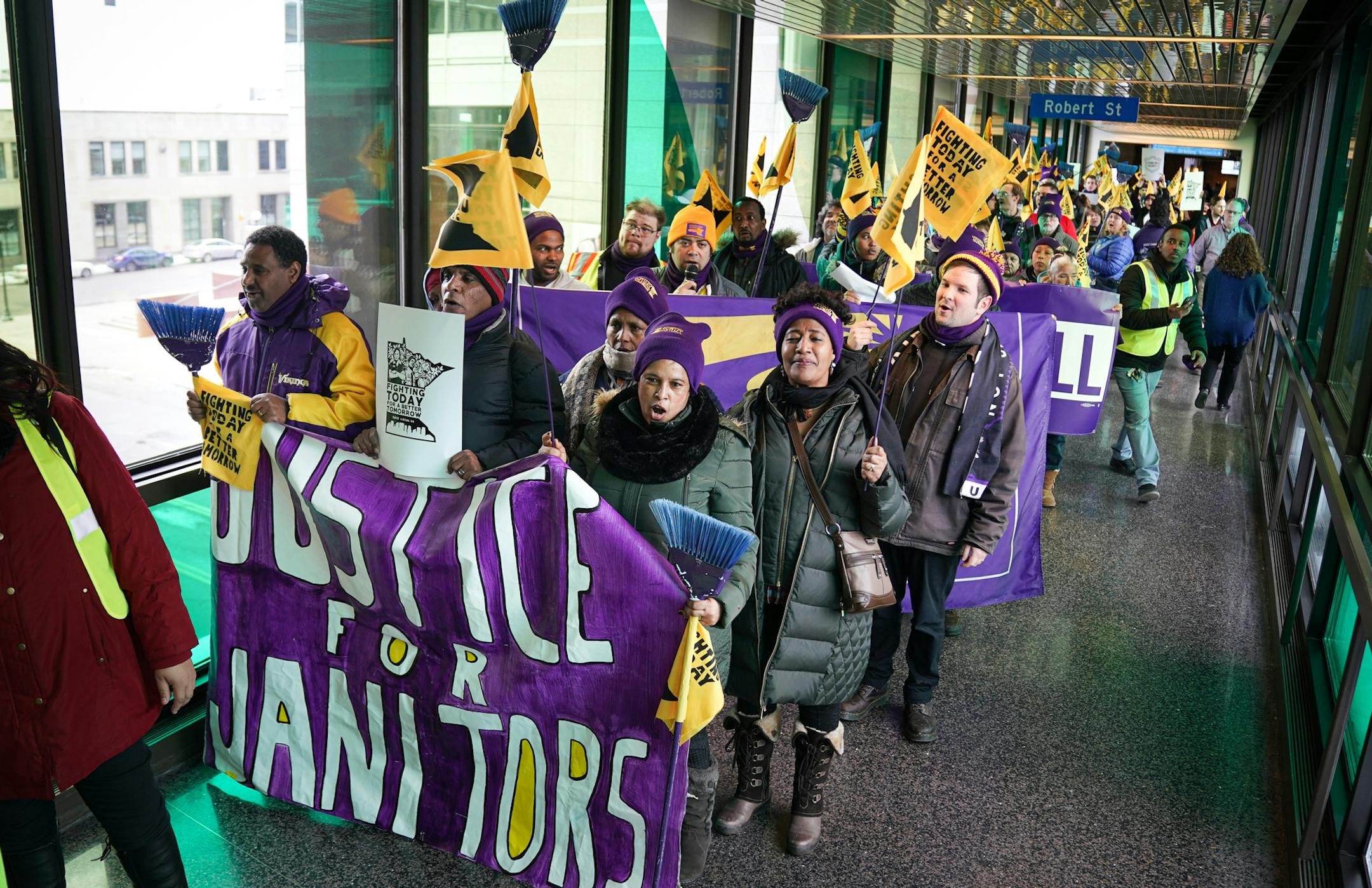 SEIU workers marched through the skyways of St Paul Monday, from Town Square to City Hall. Workers claim they've experienced wage theft and that their employers are not complying with the city's Earned Sick and Safe Time law. ] GLEN STUBBE • glen.stubbe@startribune.com Monday, December 16, 2019