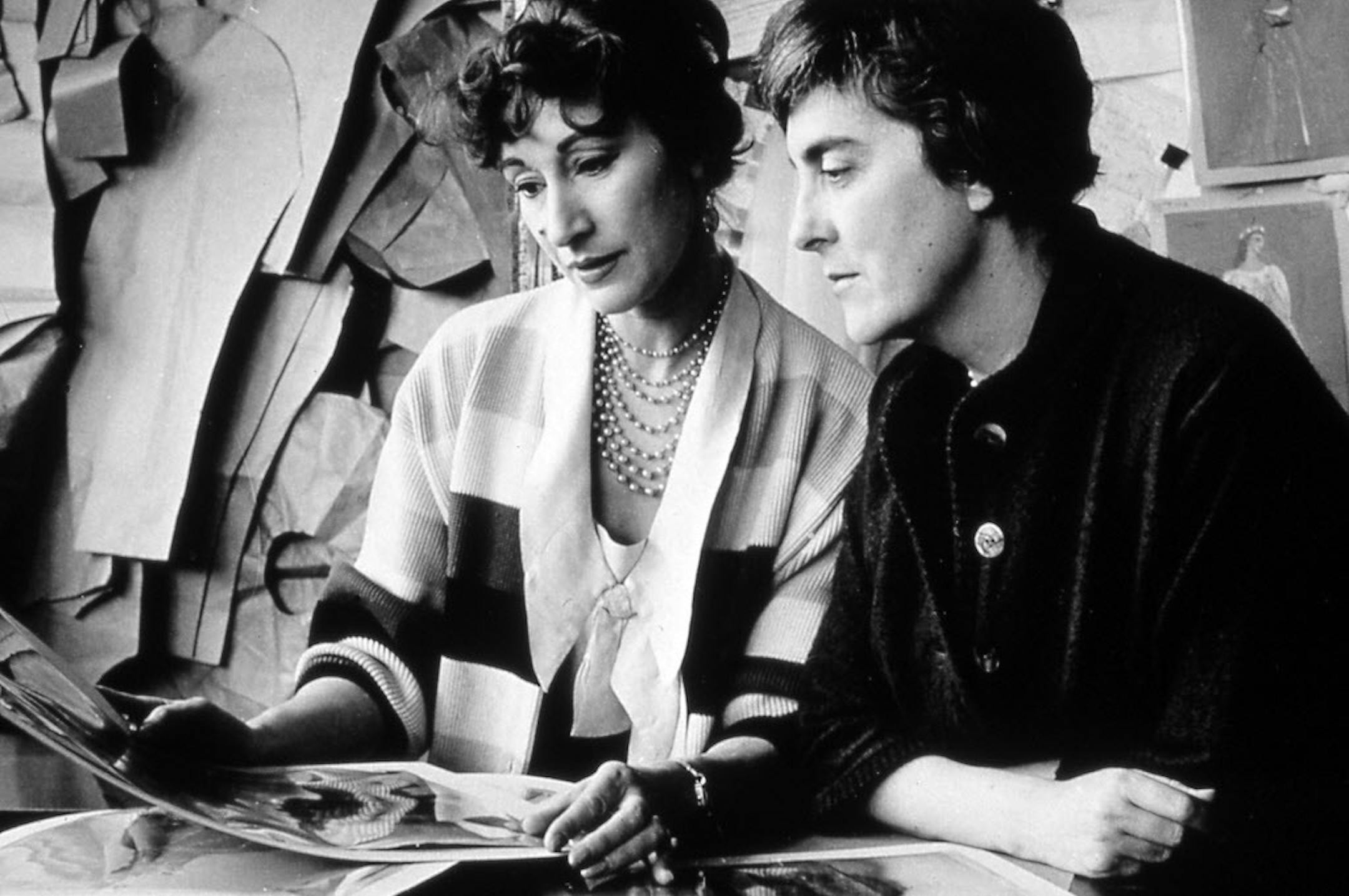 Annette Garceau, left, reviewing production renderings in 1963 at the Guthrie Theater with designer Tanya Moiseiwitsch.